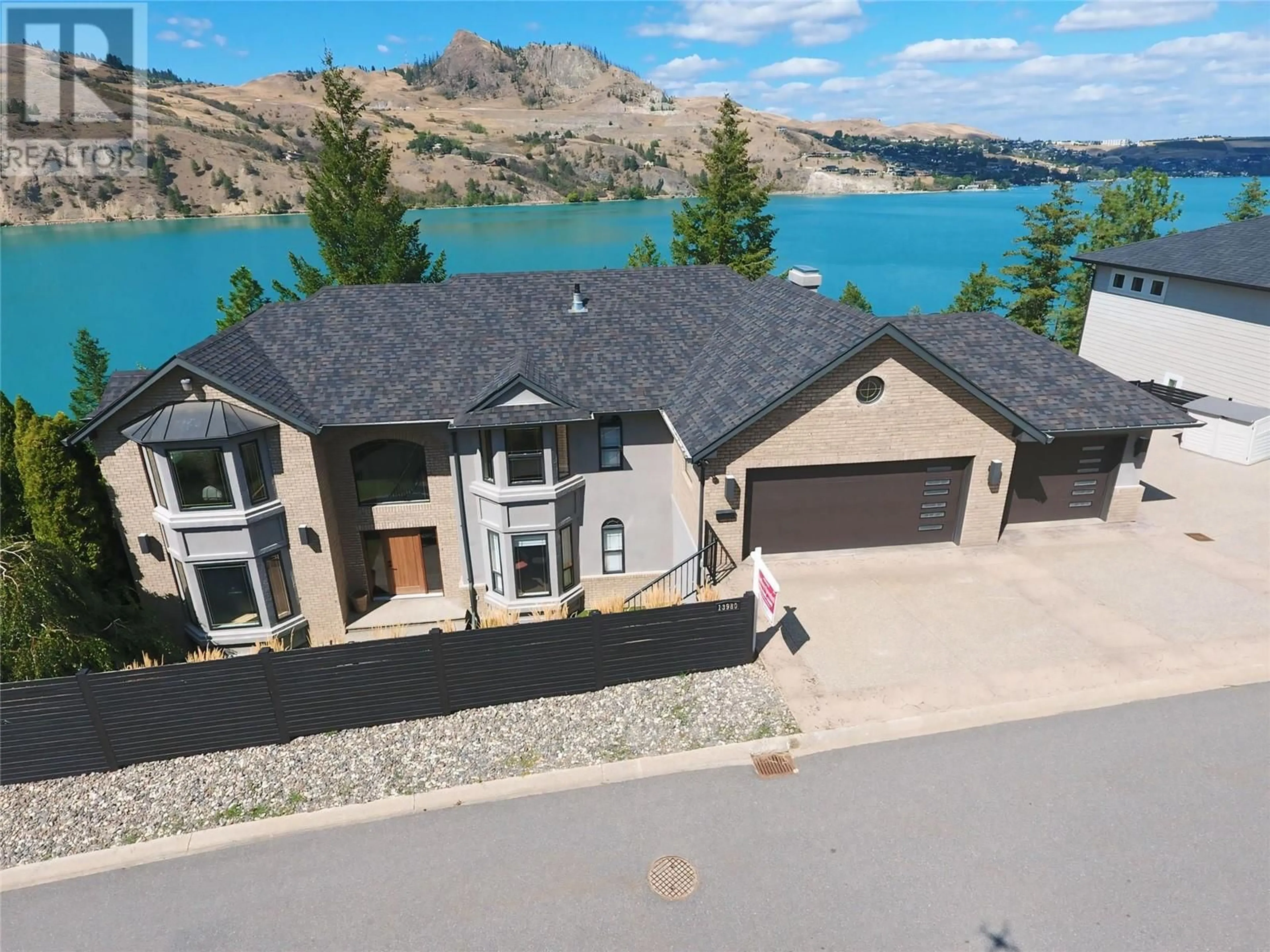 A pic from outside/outdoor area/front of a property/back of a property/a pic from drone, water/lake/river/ocean view for 13980 PONDEROSA WAY, Coldstream British Columbia V1B1A4