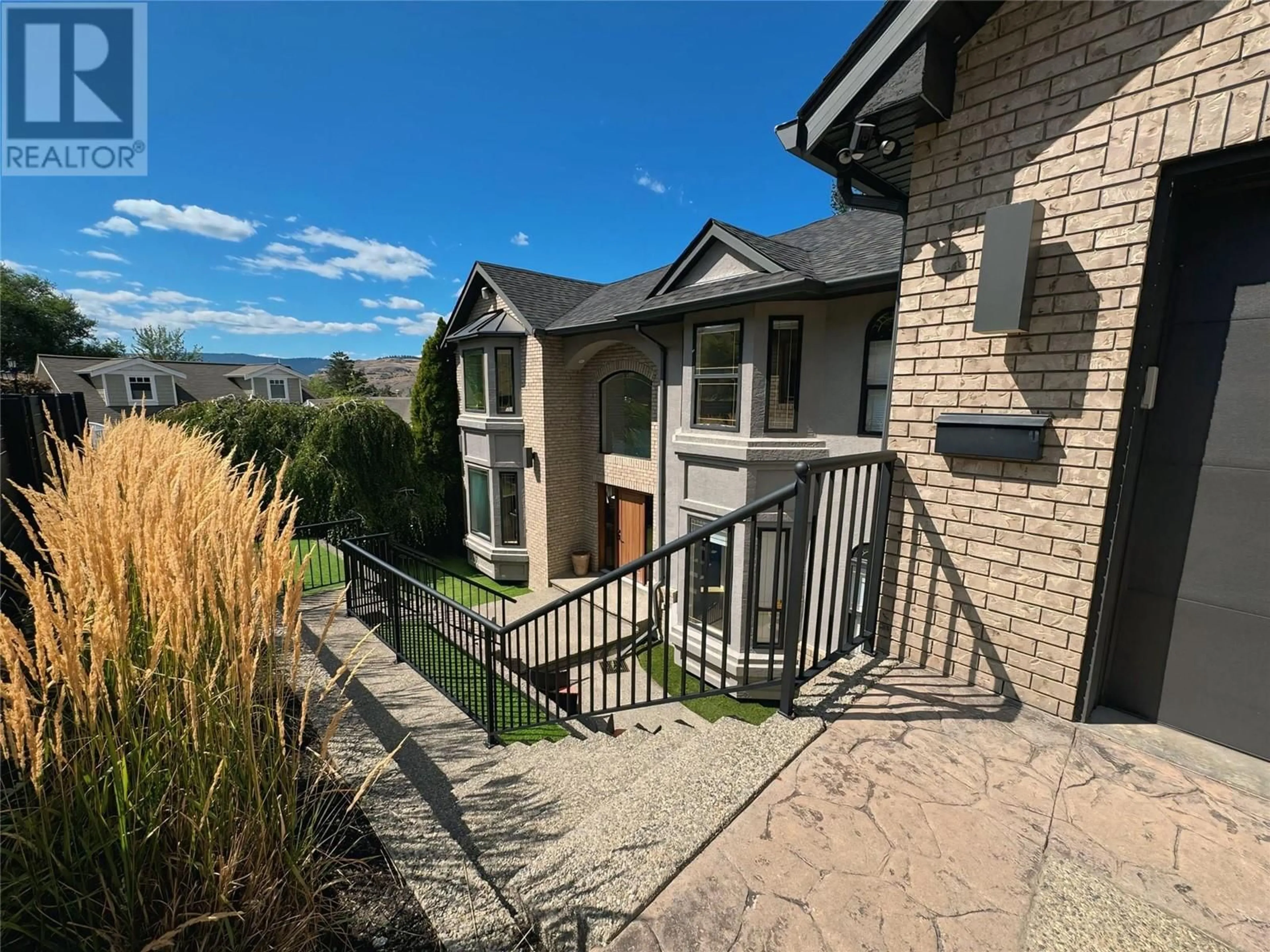 A pic from outside/outdoor area/front of a property/back of a property/a pic from drone, mountain view for 13980 PONDEROSA WAY, Coldstream British Columbia V1B1A4
