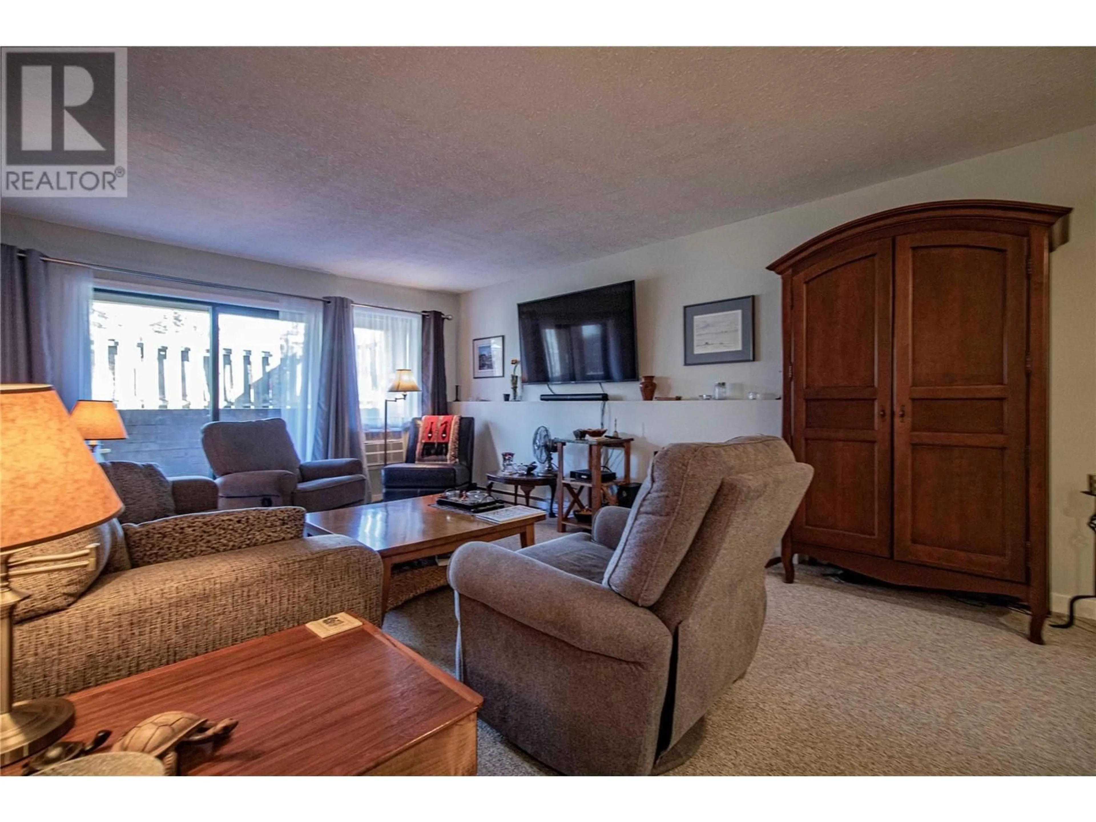 Living room with furniture, unknown for 104 - 740 WINNIPEG STREET, Penticton British Columbia V2A5N3