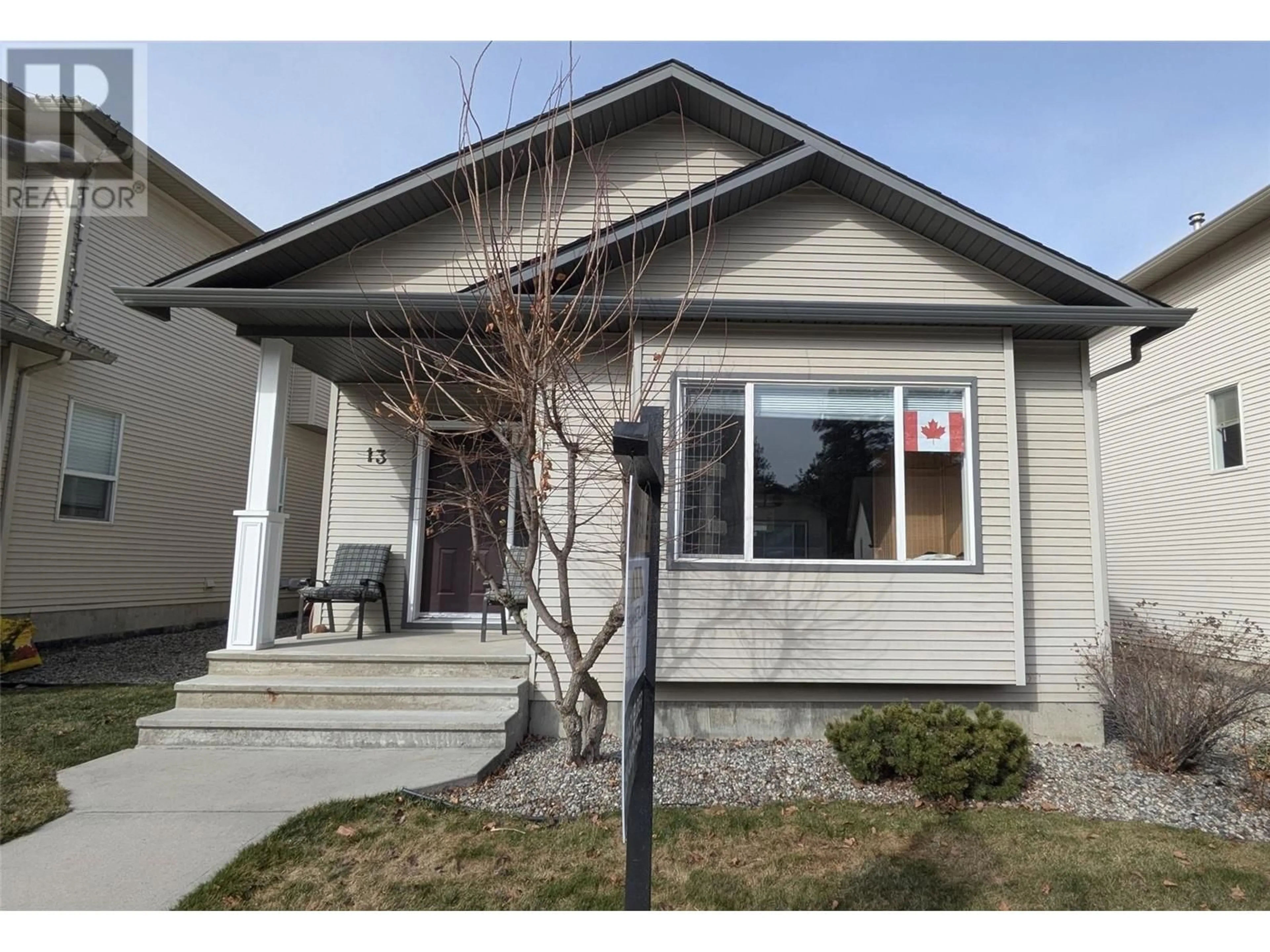 Home with vinyl exterior material, street for 13 - 2210 HORIZON DRIVE, West Kelowna British Columbia V1Z3L4