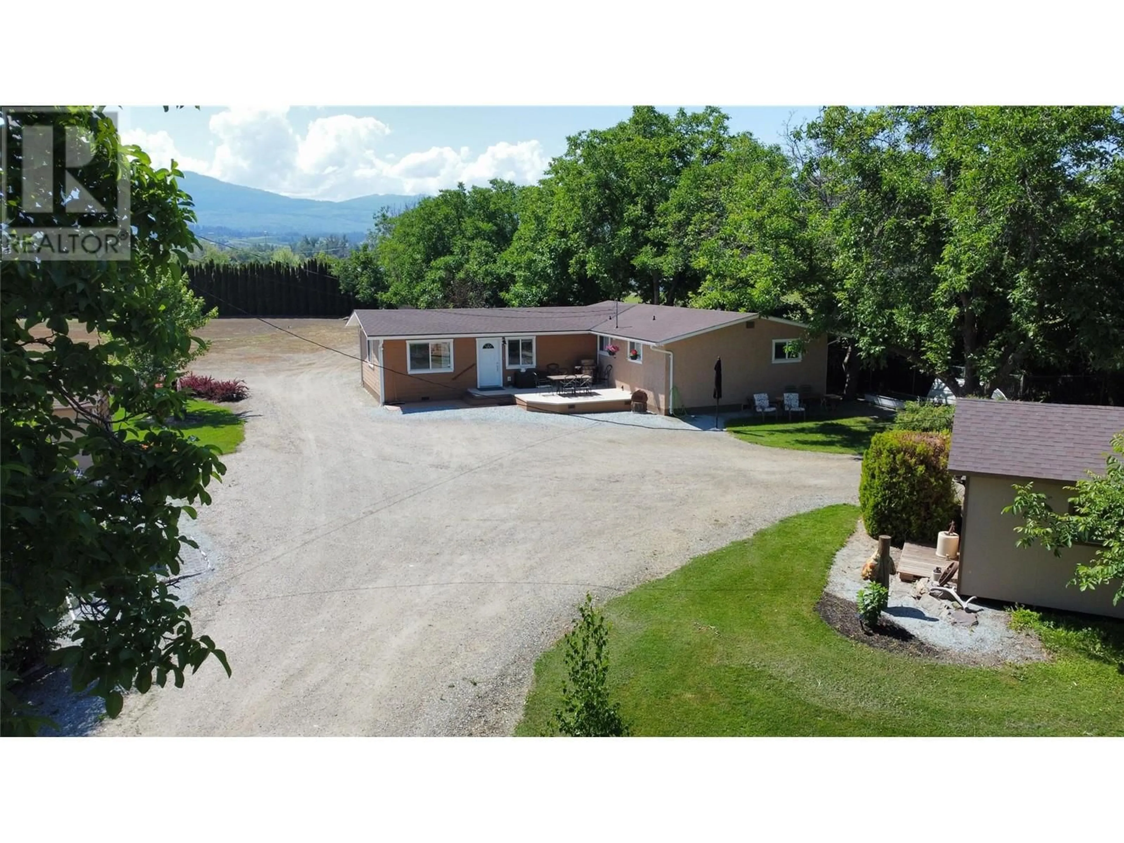 A pic from outside/outdoor area/front of a property/back of a property/a pic from drone, mountain view for 1789 MUNSON ROAD, Kelowna British Columbia V1W2G8