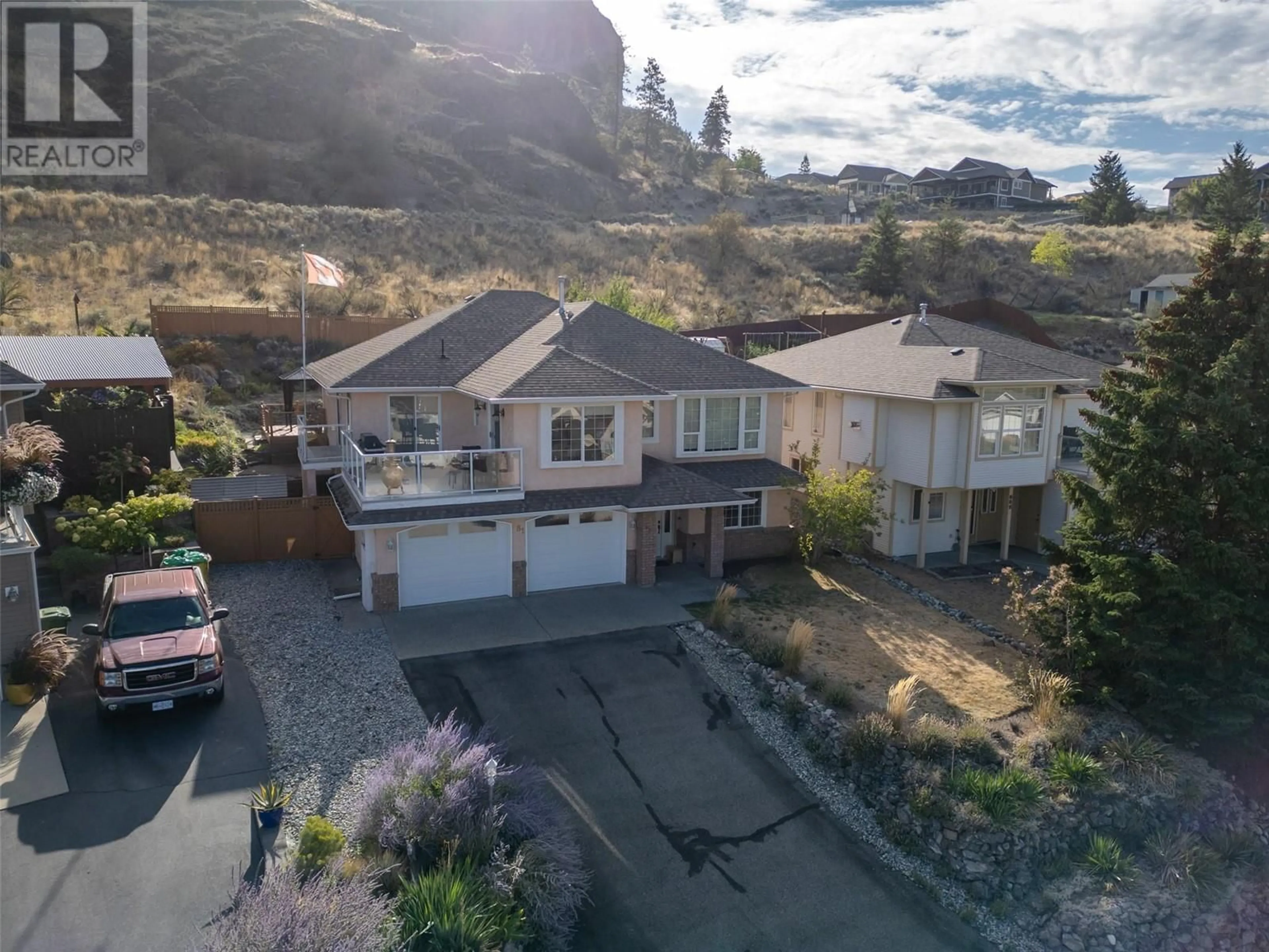 A pic from outside/outdoor area/front of a property/back of a property/a pic from drone, mountain view for 981 PEACHCLIFF DRIVE, Okanagan Falls British Columbia V0H1R1