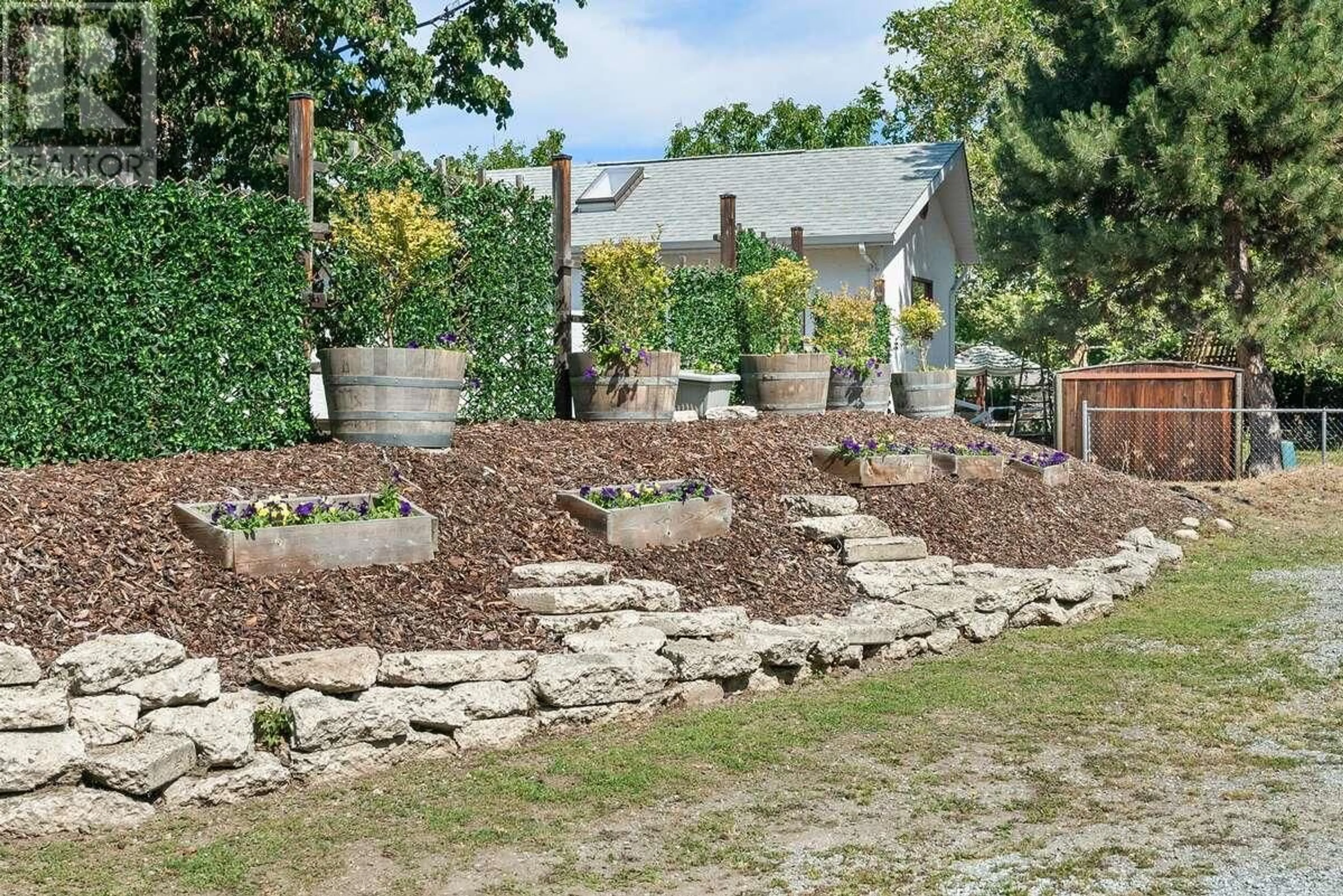A pic from outside/outdoor area/front of a property/back of a property/a pic from drone, street for 4377 GORDON DRIVE, Kelowna British Columbia V1W1S7