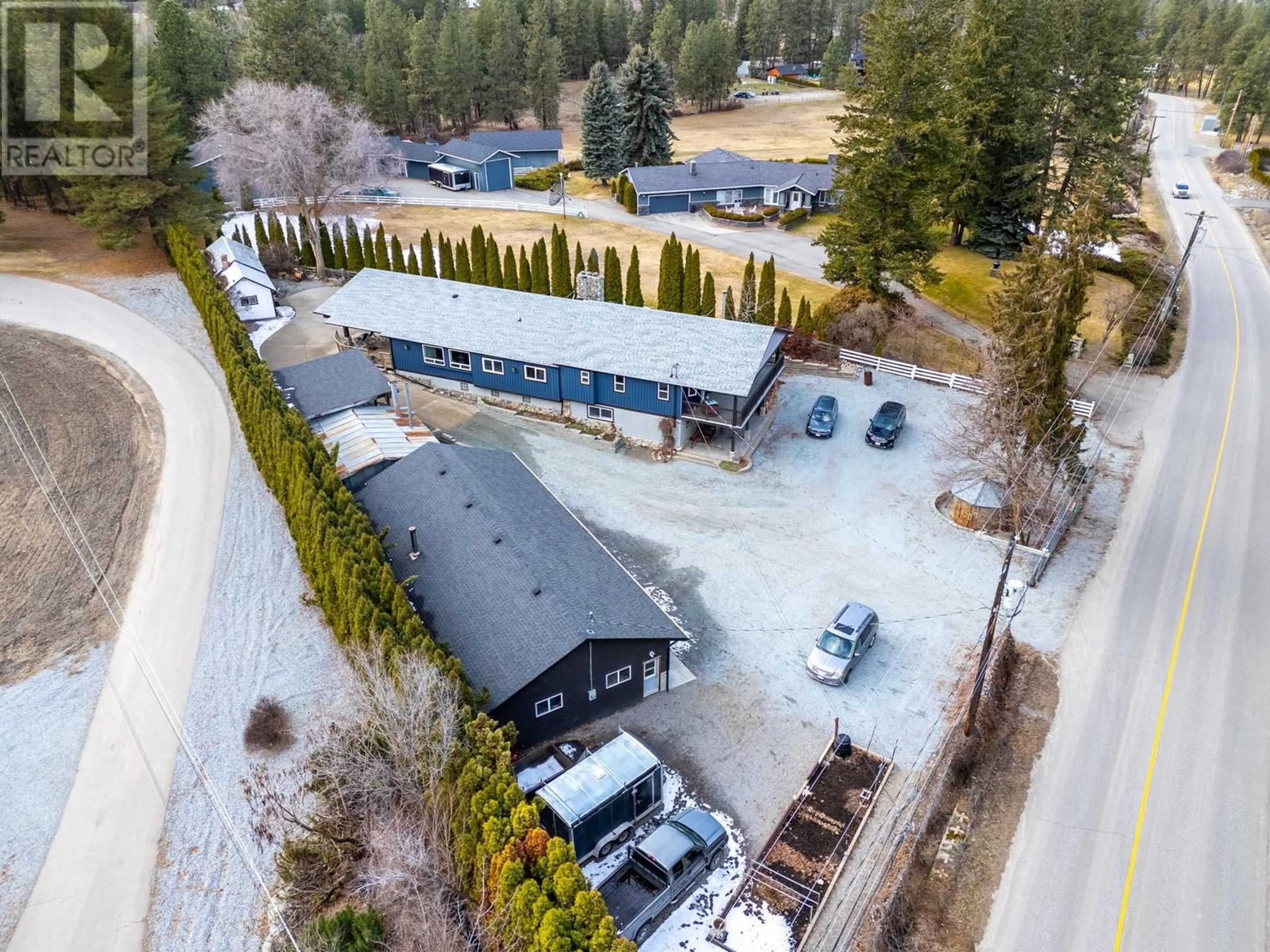 A pic from outside/outdoor area/front of a property/back of a property/a pic from drone, unknown for 4150 JUNE SPRINGS ROAD, Kelowna British Columbia V1W4C9