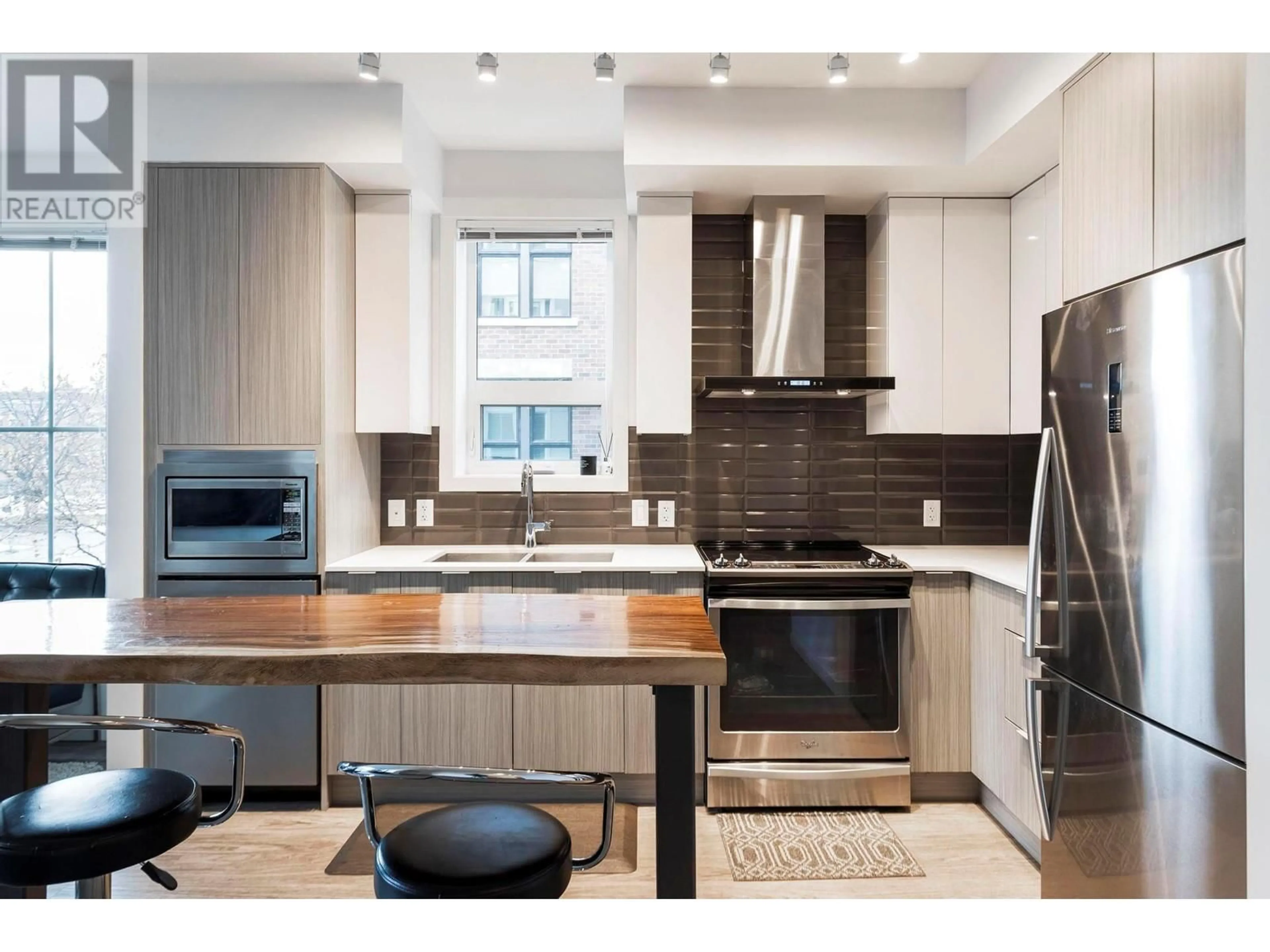 Open concept kitchen, unknown for 206 - 1770 RICHTER STREET, Kelowna British Columbia V1Y0E6