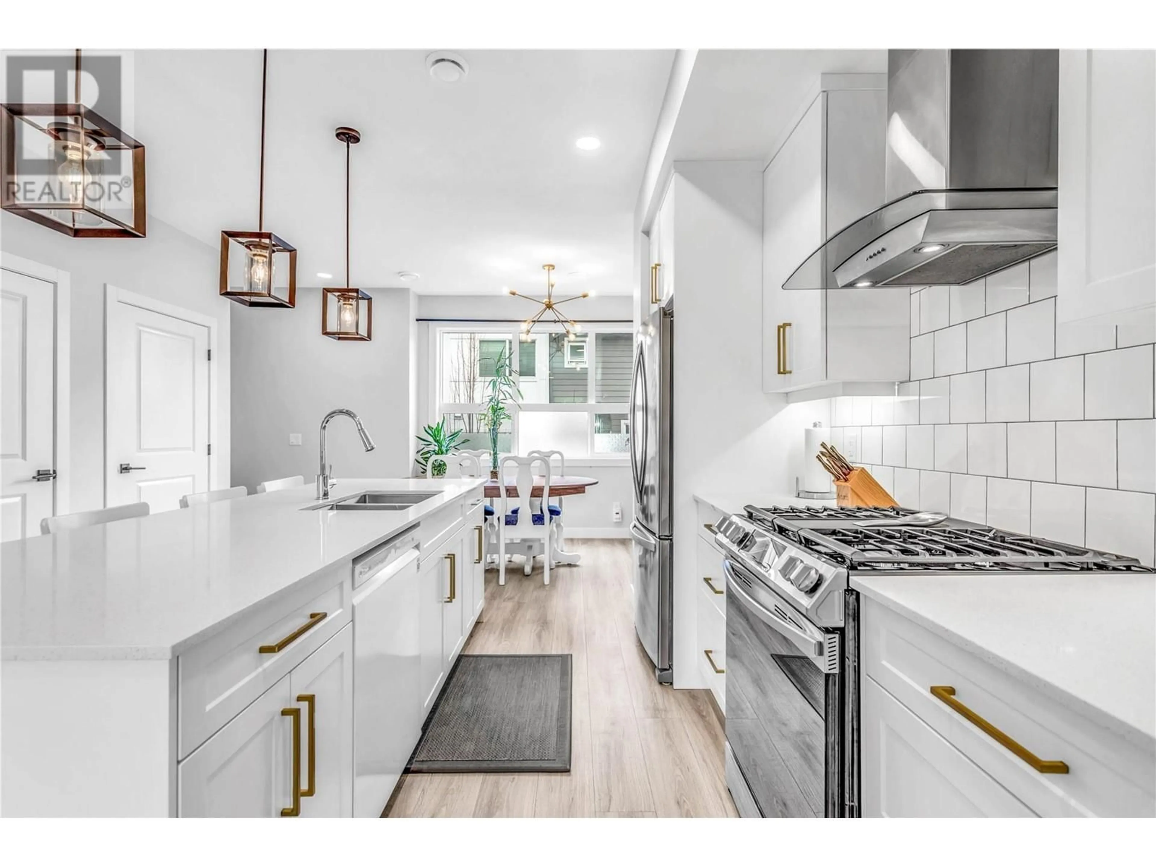 Open concept kitchen, ceramic/tile floor for 15 - 12075 OCEOLA ROAD, Lake Country British Columbia V4V0A7