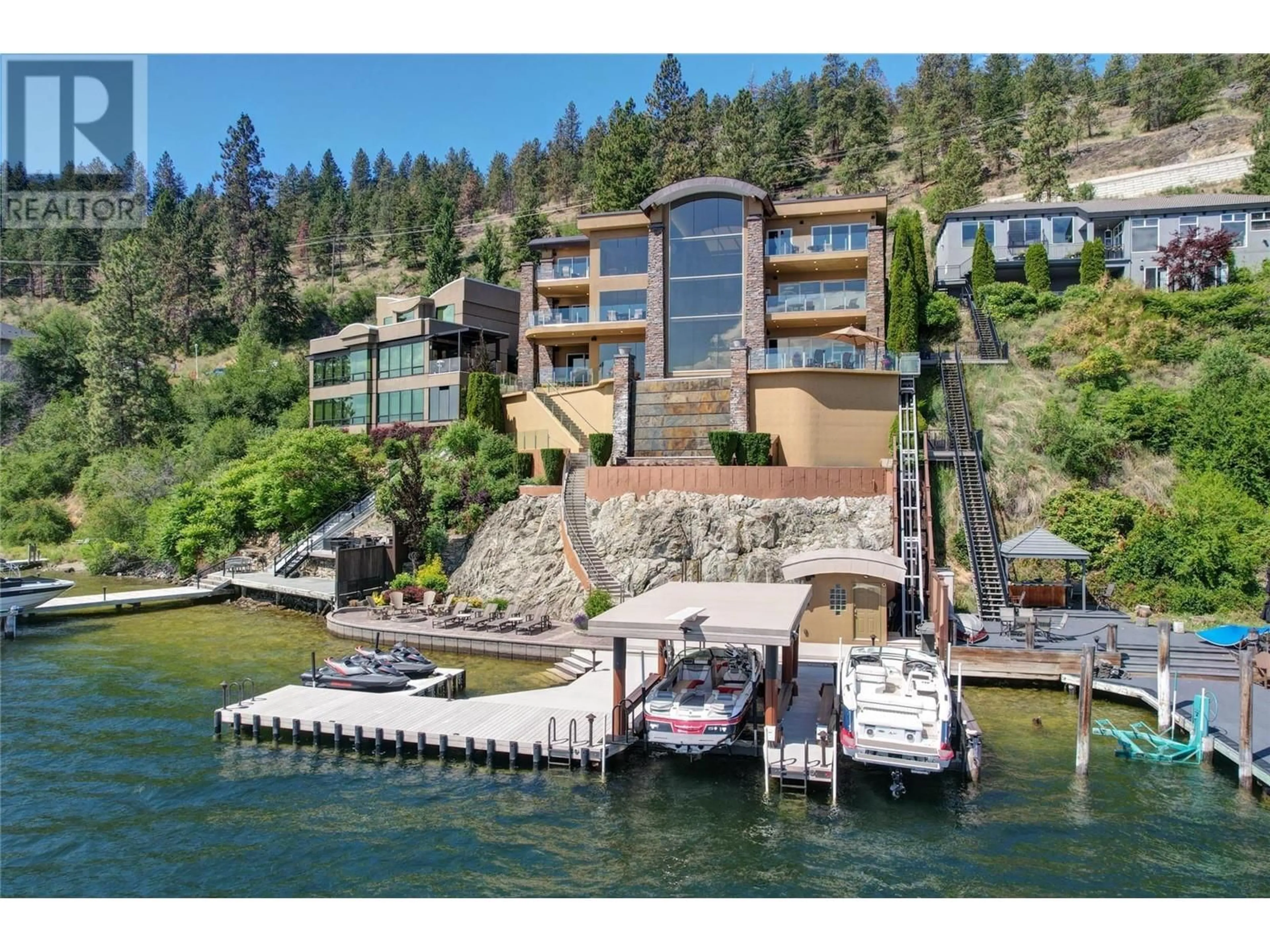 A pic from outside/outdoor area/front of a property/back of a property/a pic from drone, water/lake/river/ocean view for 6 - 901 WESTSIDE ROAD SOUTH, West Kelowna British Columbia V1Z3W9