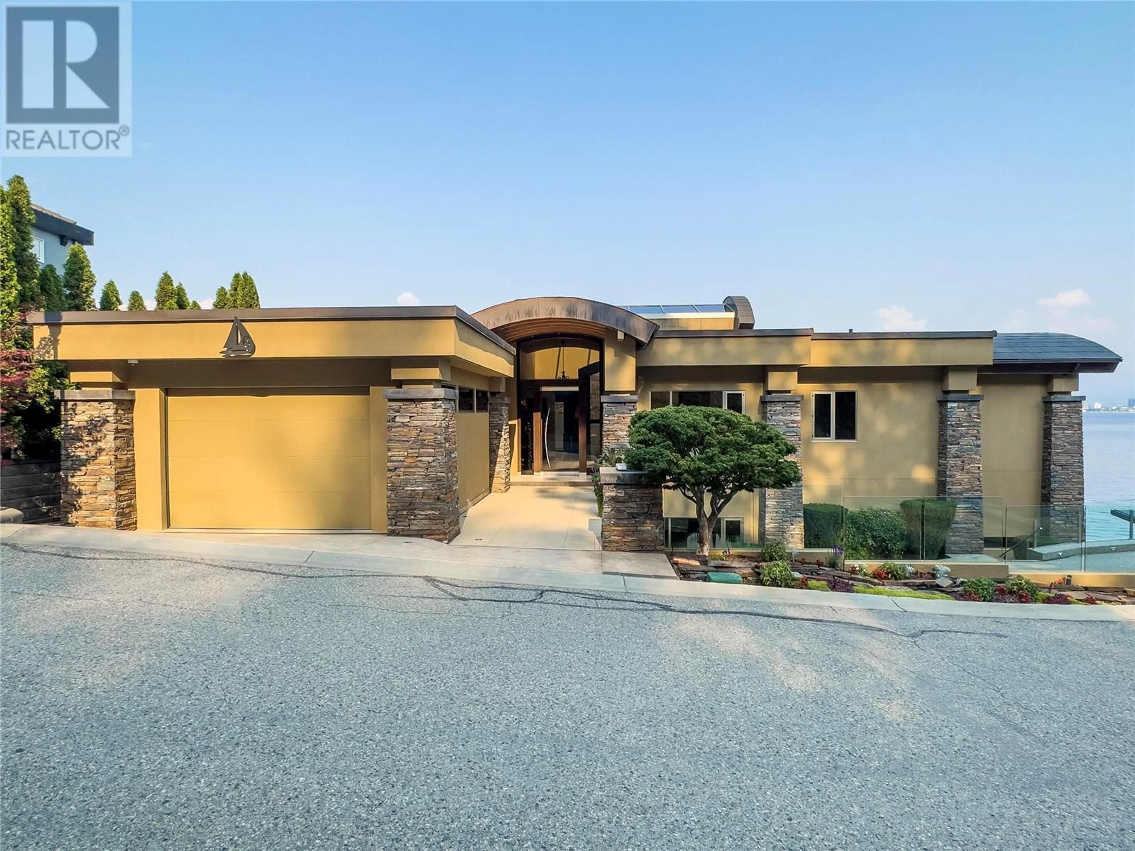 Home with brick exterior material, street for 6 - 901 WESTSIDE ROAD SOUTH, West Kelowna British Columbia V1Z3W9