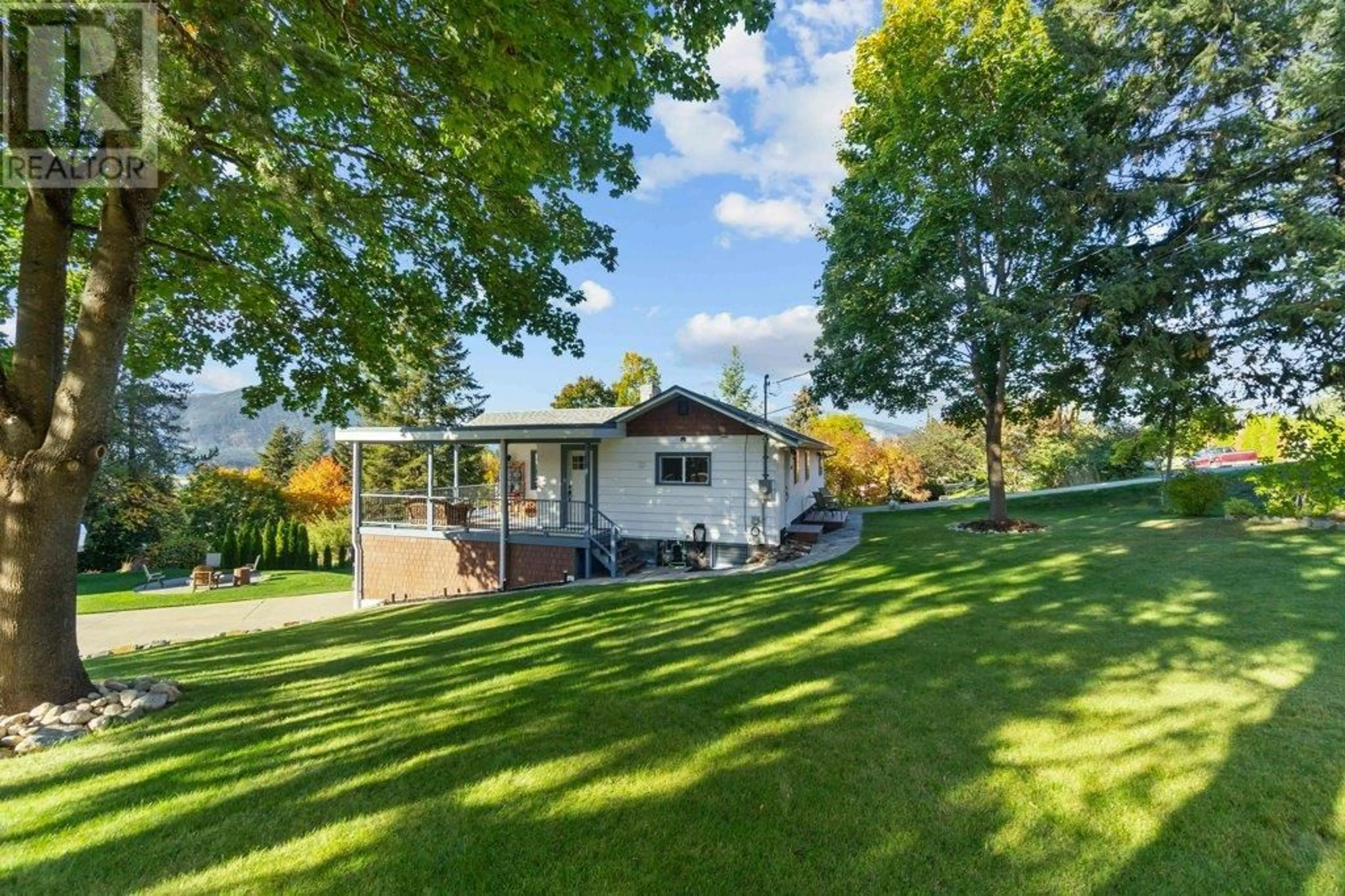 A pic from outside/outdoor area/front of a property/back of a property/a pic from drone, water/lake/river/ocean view for 1171 15 STREET SOUTHEAST, Salmon Arm British Columbia V1E2E3