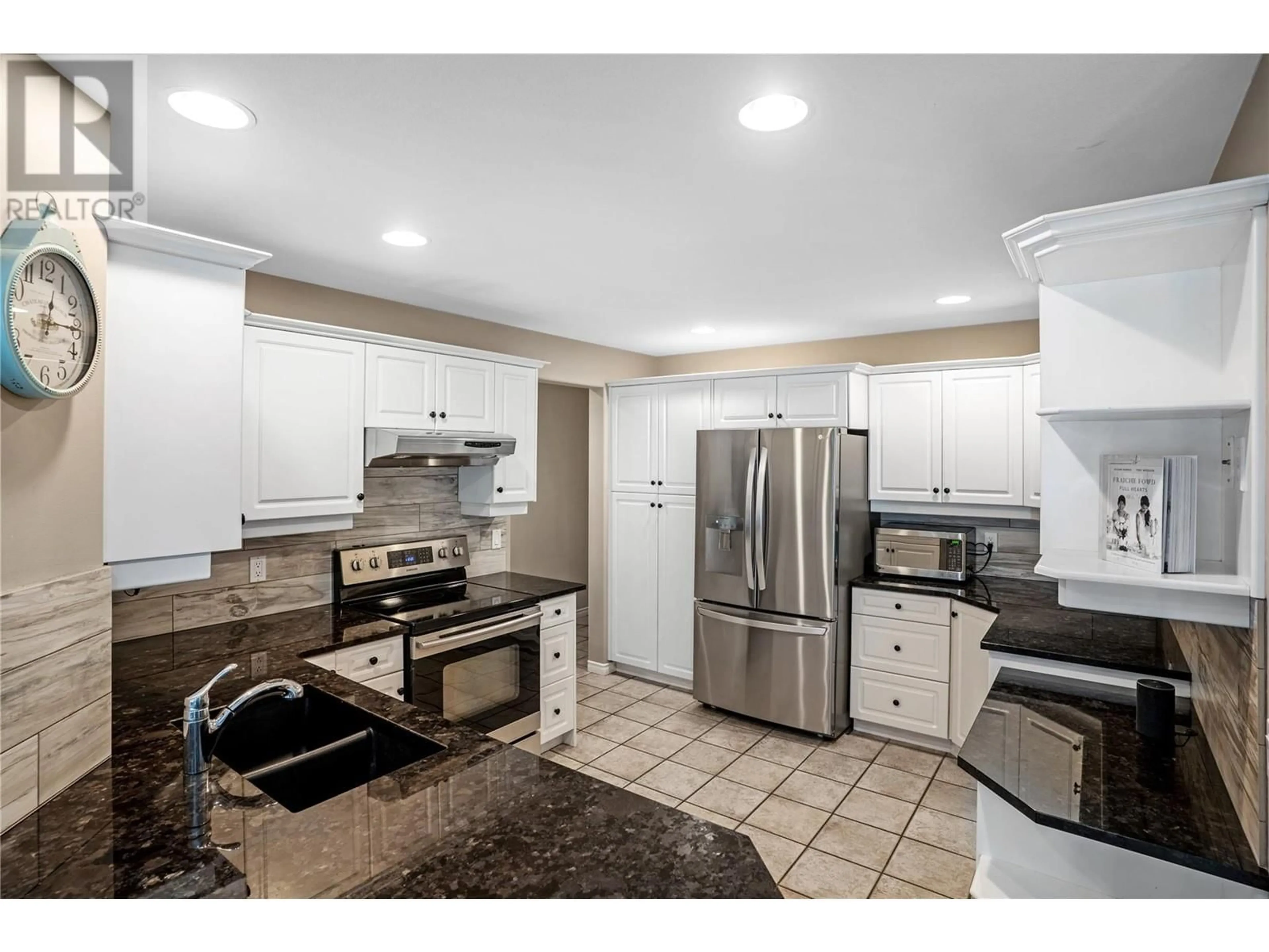 Standard kitchen, ceramic/tile floor for 1083 CHILCOTIN CRESCENT, Kelowna British Columbia V1V2L7