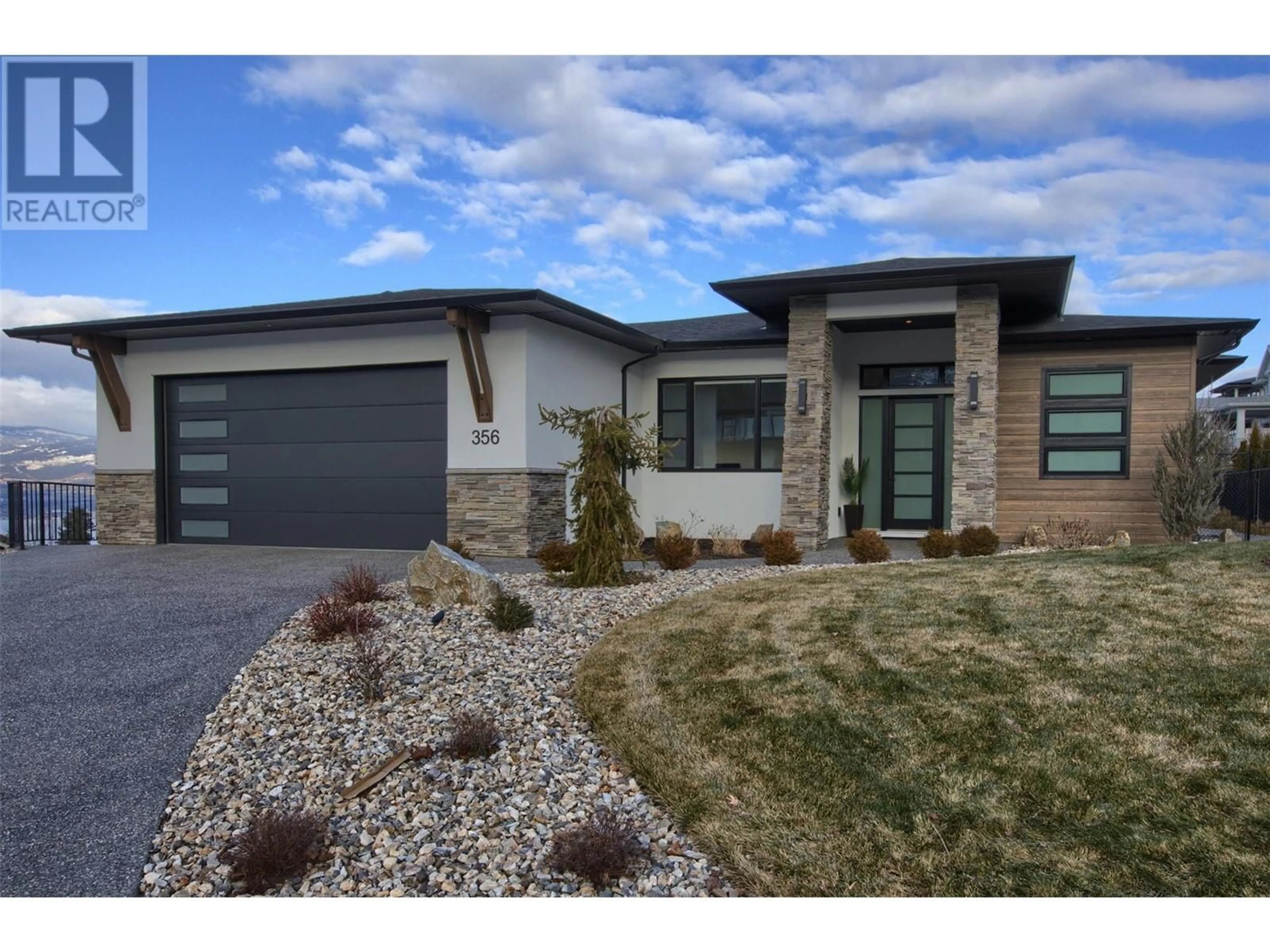 Home with brick exterior material, street for 356 Tanager Drive, Kelowna British Columbia V1W4T6