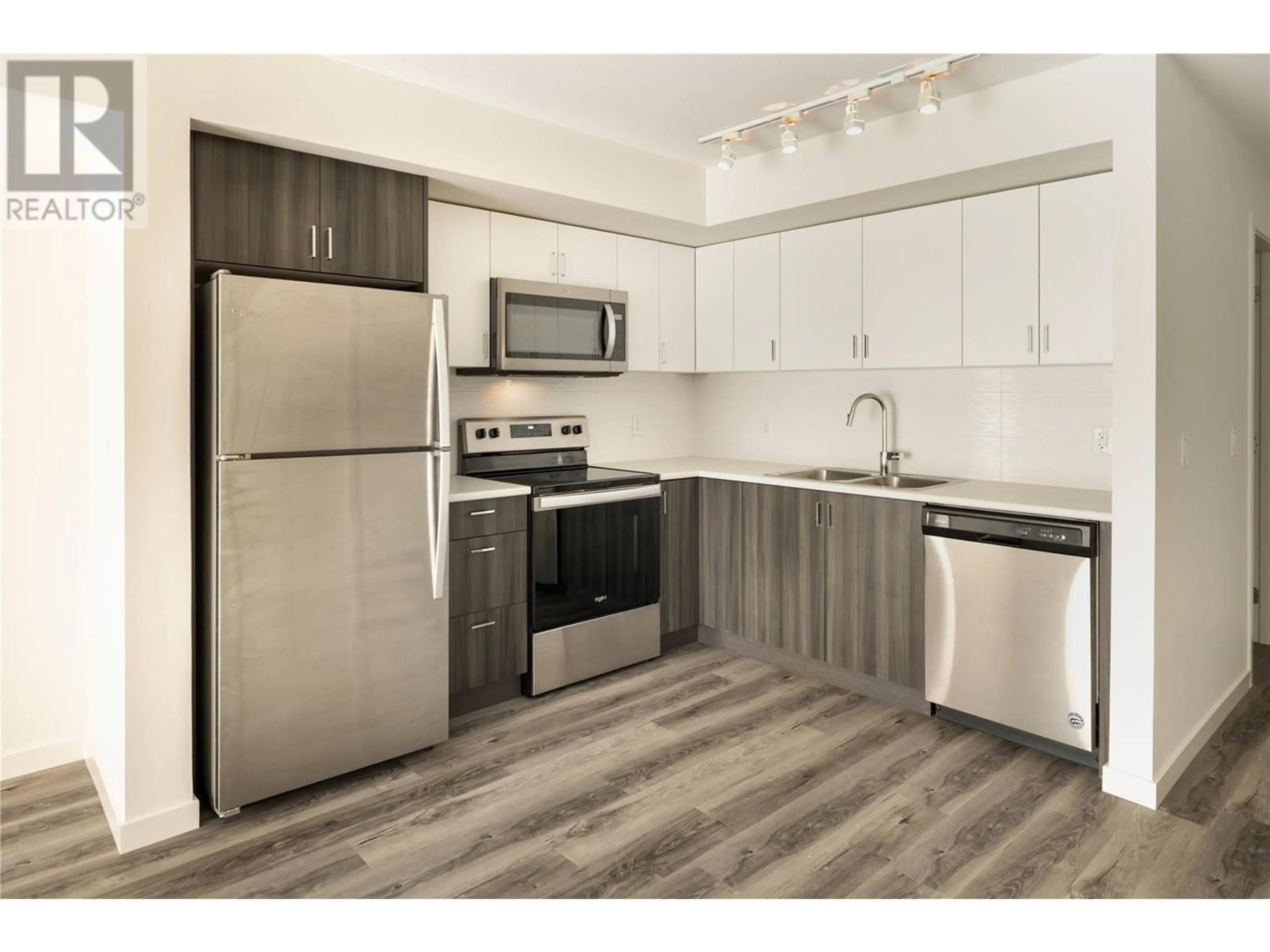 Standard kitchen, wood/laminate floor for PH20 - 625 ACADEMY WAY, Kelowna British Columbia V1V0A2