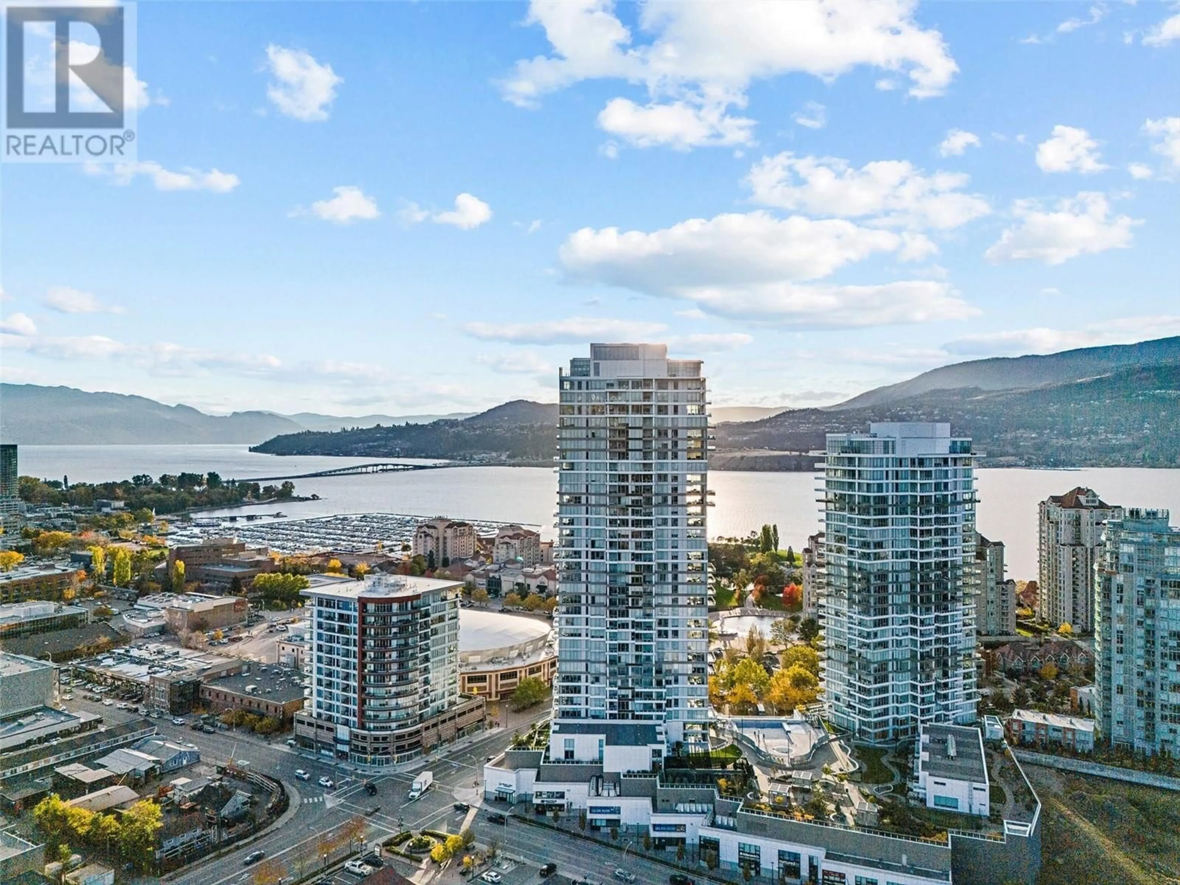 A pic from outside/outdoor area/front of a property/back of a property/a pic from drone, water/lake/river/ocean view for 3302 - 1191 SUNSET DRIVE, Kelowna British Columbia V1Y0J4