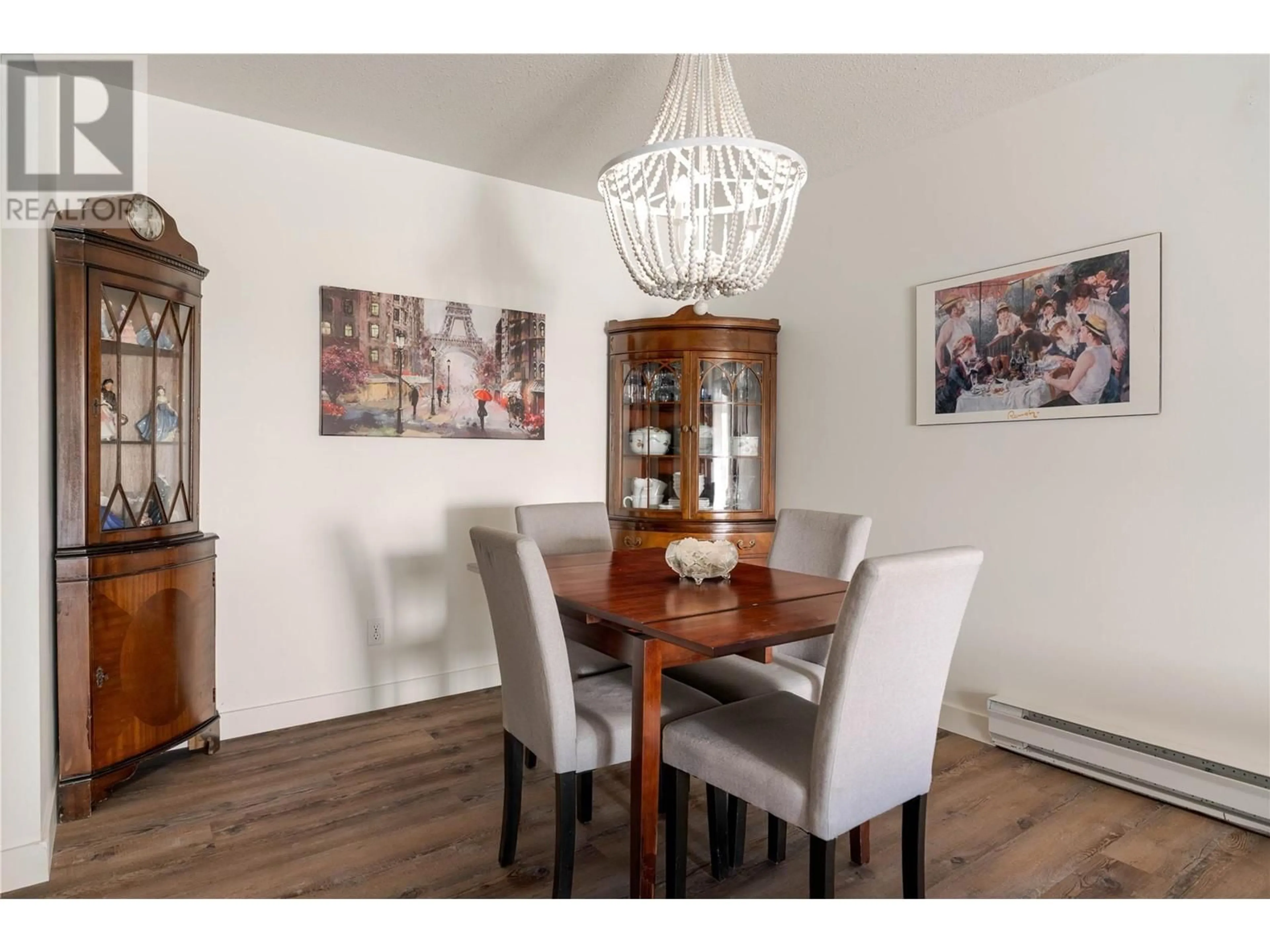 Dining room, wood/laminate floor for 405 - 240 HOLLYWOOD ROAD NORTH, Kelowna British Columbia V1X6Y9