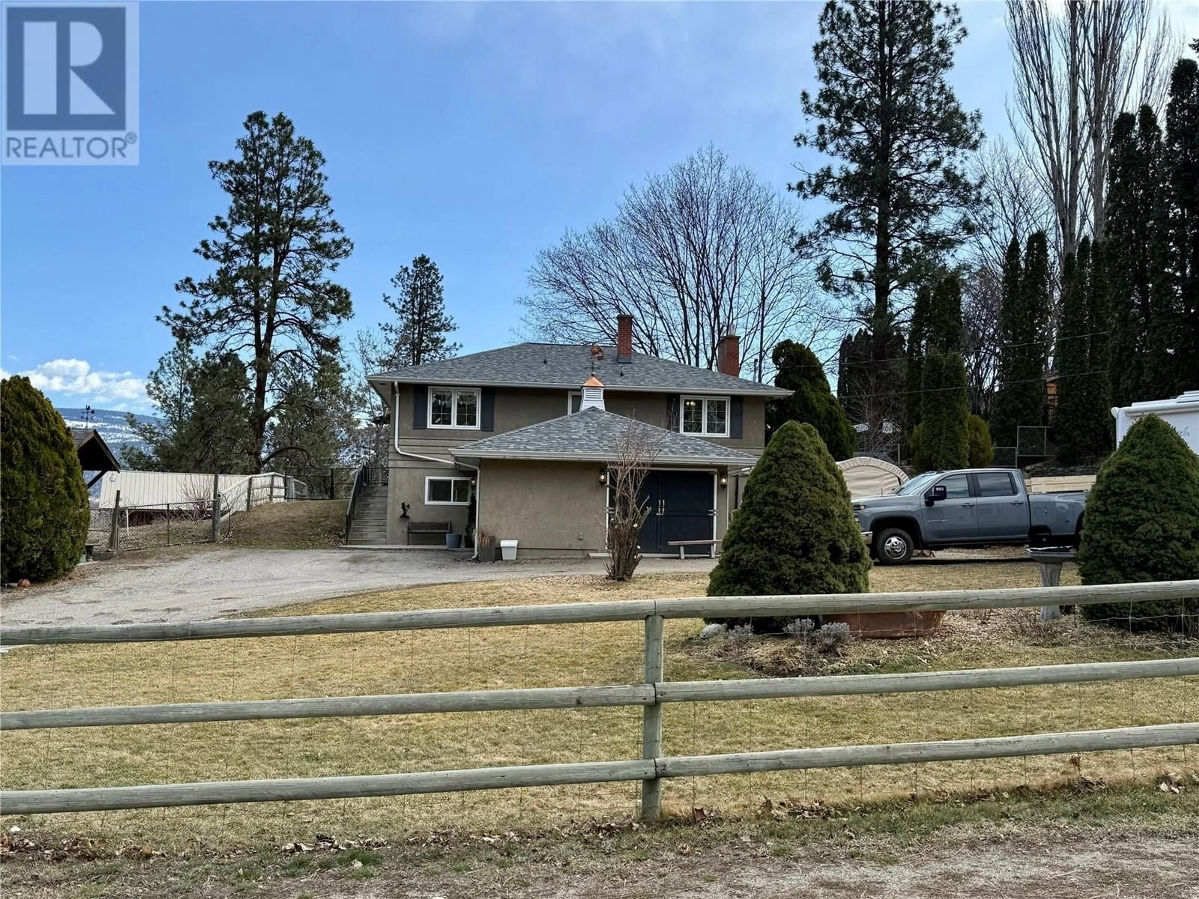 A pic from outside/outdoor area/front of a property/back of a property/a pic from drone, street for 2211 WEST BENCH DRIVE, Penticton British Columbia V2A8Z8
