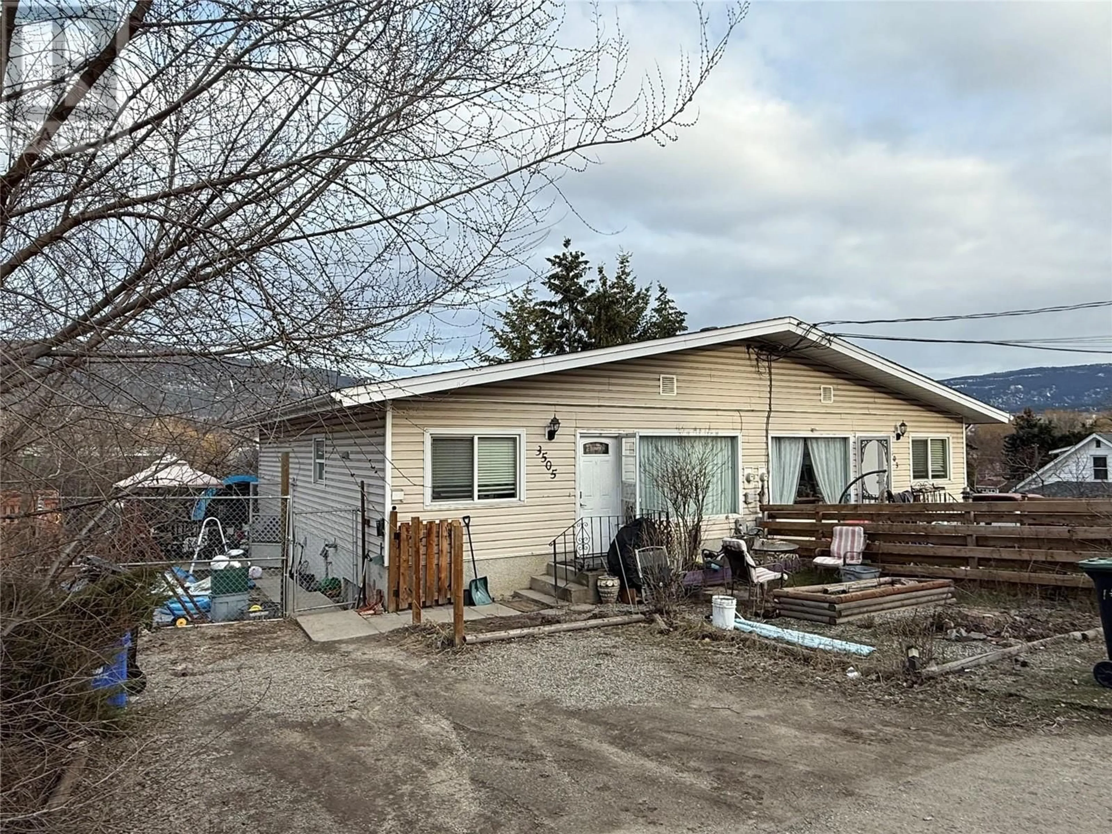 A pic from outside/outdoor area/front of a property/back of a property/a pic from drone, street for 3503 35 STREET, Vernon British Columbia V1T6C2