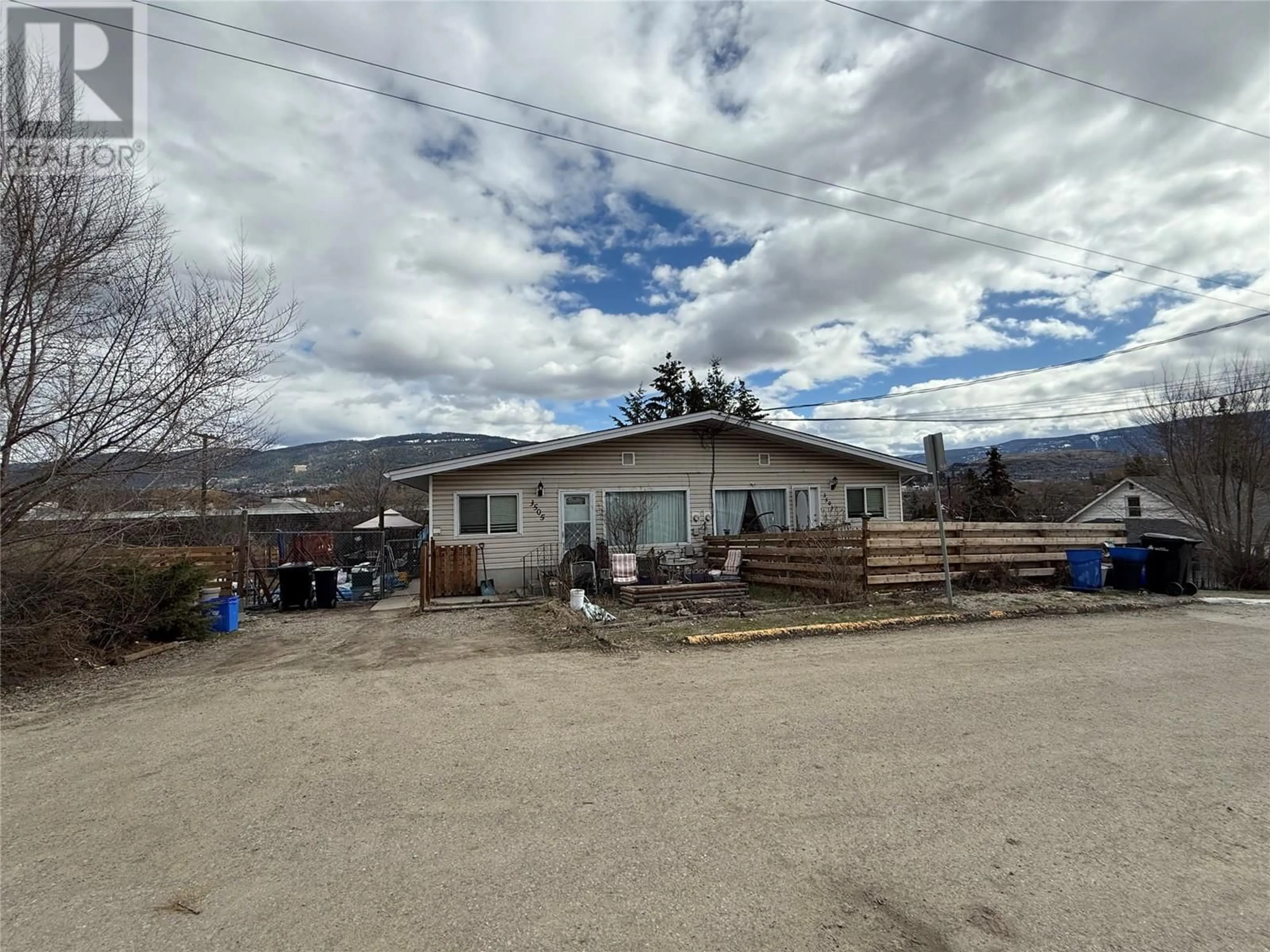 A pic from outside/outdoor area/front of a property/back of a property/a pic from drone, mountain view for 3503 35 STREET, Vernon British Columbia V1T6C2