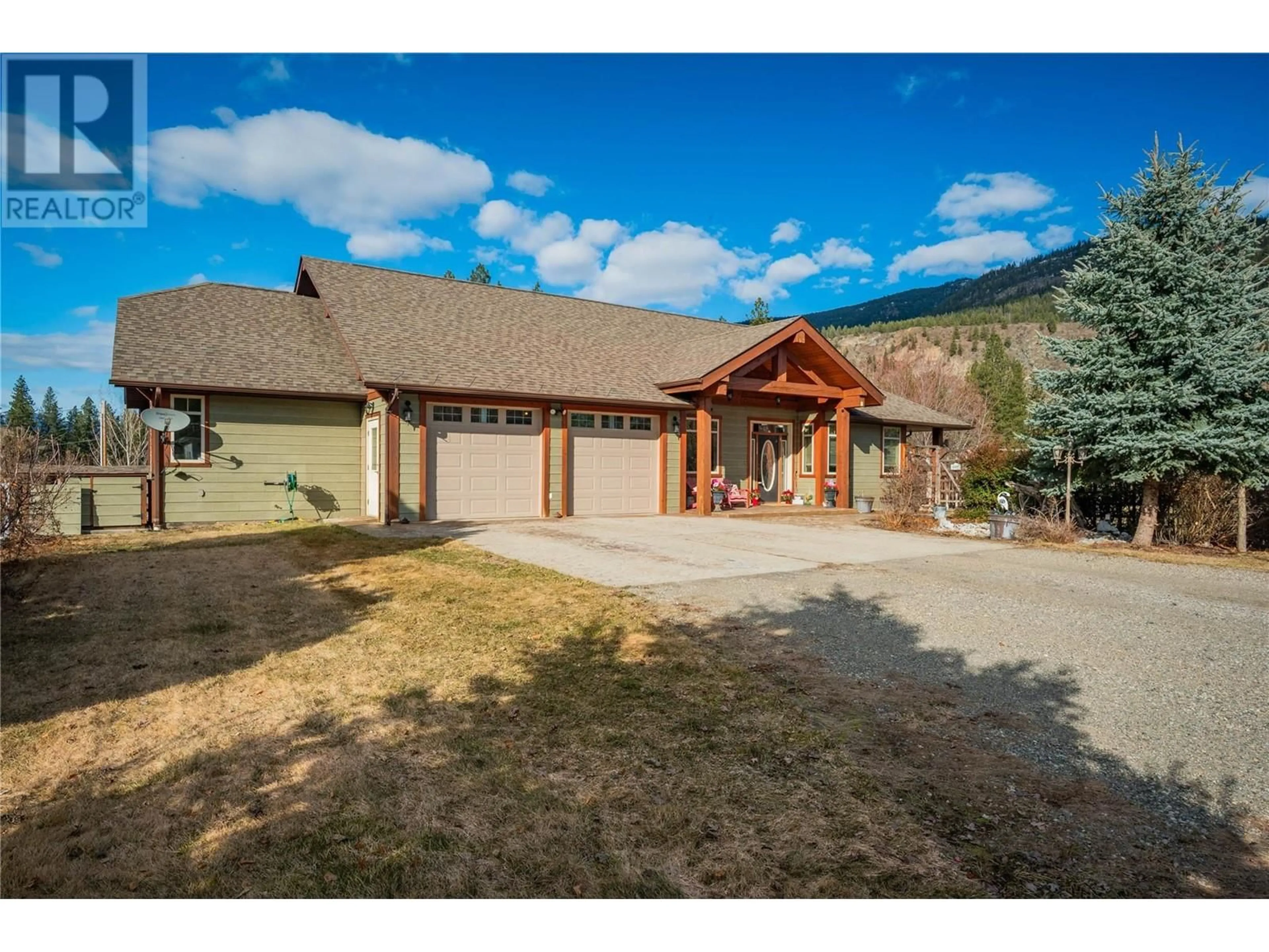 A pic from outside/outdoor area/front of a property/back of a property/a pic from drone, mountain view for 250 1ST AVENUE, Christina Lake British Columbia V0H1E0