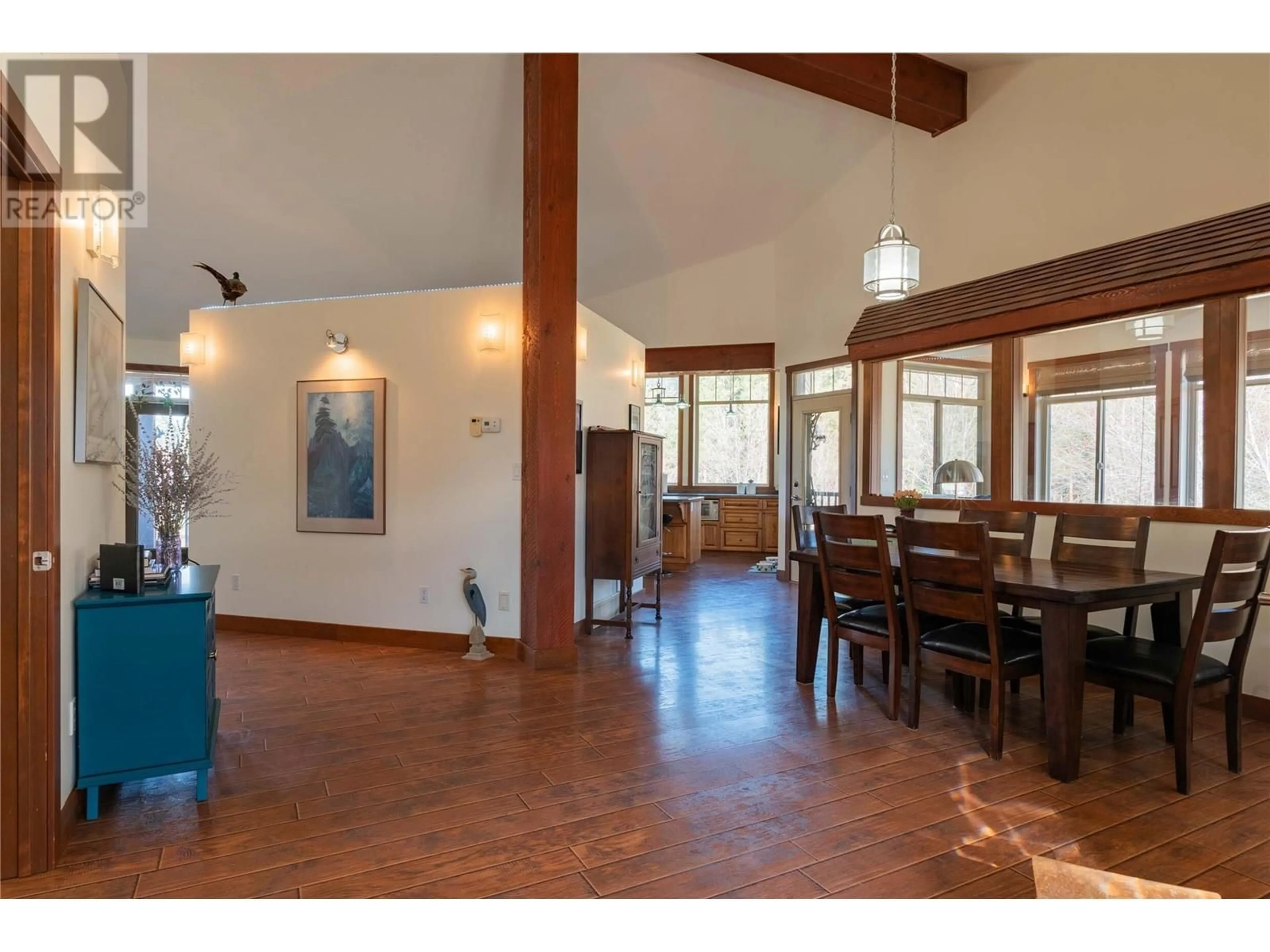 Dining room, wood/laminate floor for 250 1ST AVENUE, Christina Lake British Columbia V0H1E0