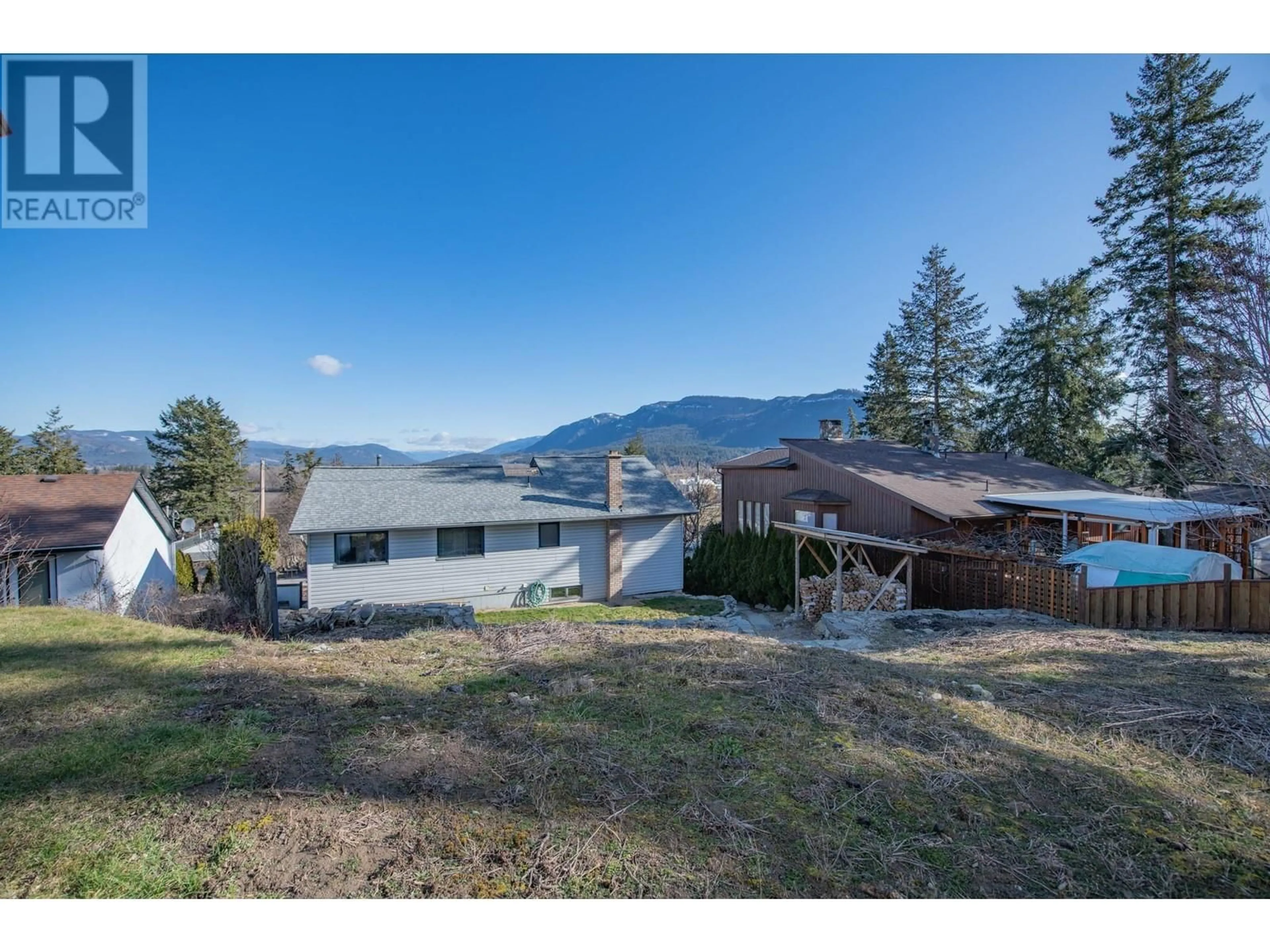 A pic from outside/outdoor area/front of a property/back of a property/a pic from drone, water/lake/river/ocean view for 135 BIRCH CRESCENT, Enderby British Columbia V4Y4C1