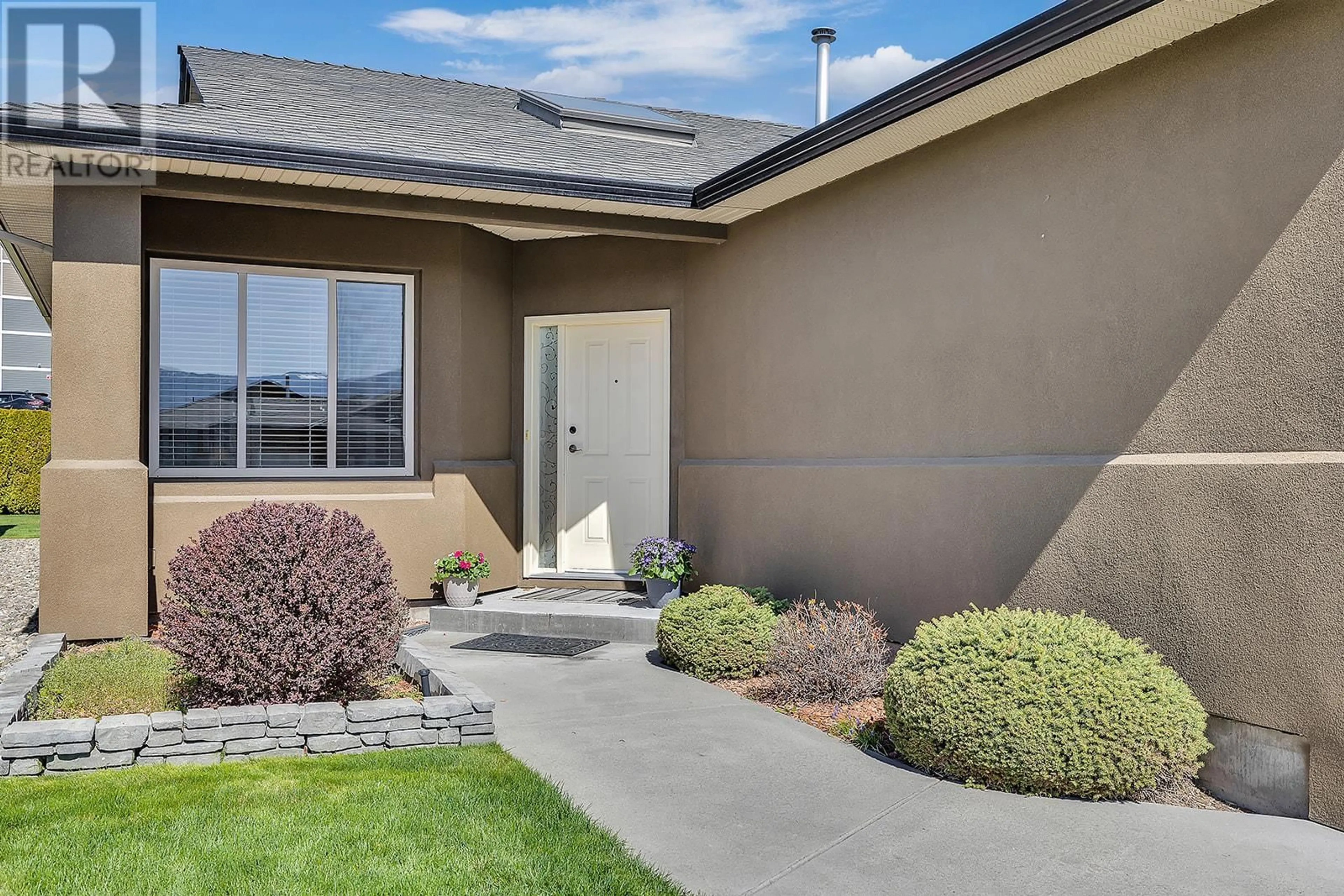 Home with vinyl exterior material, street for 2386 MESA VISTA COURT, Westbank British Columbia V4T2X9