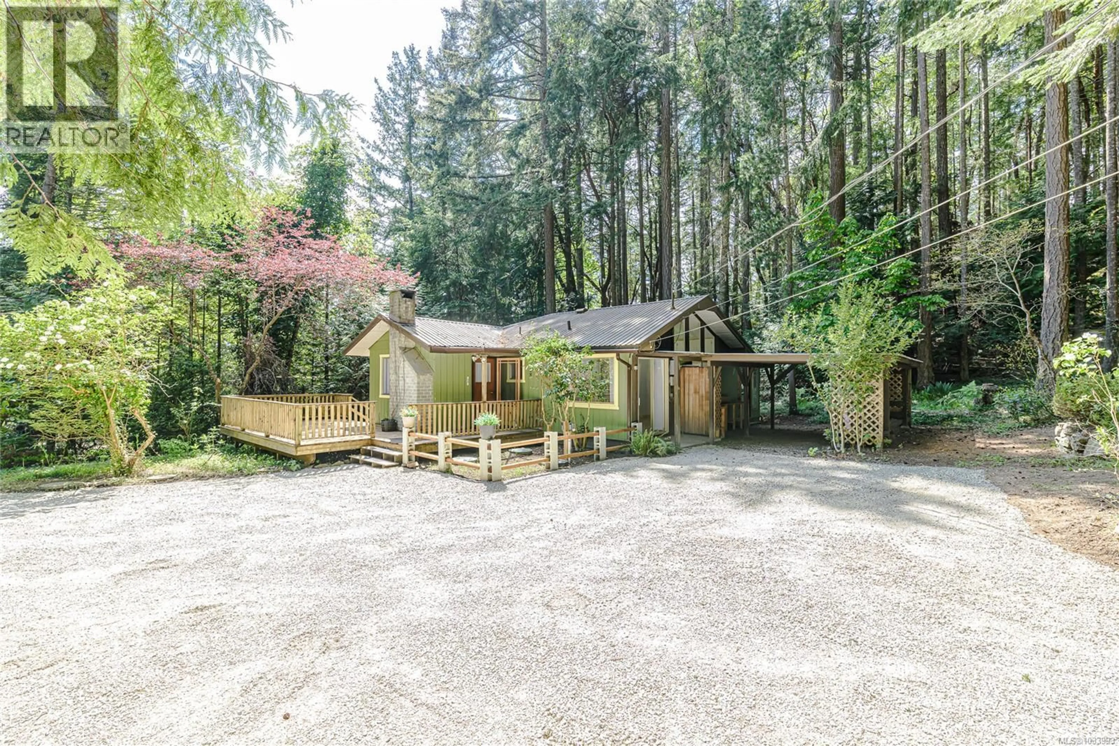 A pic from outside/outdoor area/front of a property/back of a property/a pic from drone, forest/trees view for 128 SUNSET DRIVE, Salt Spring British Columbia V8K1L3