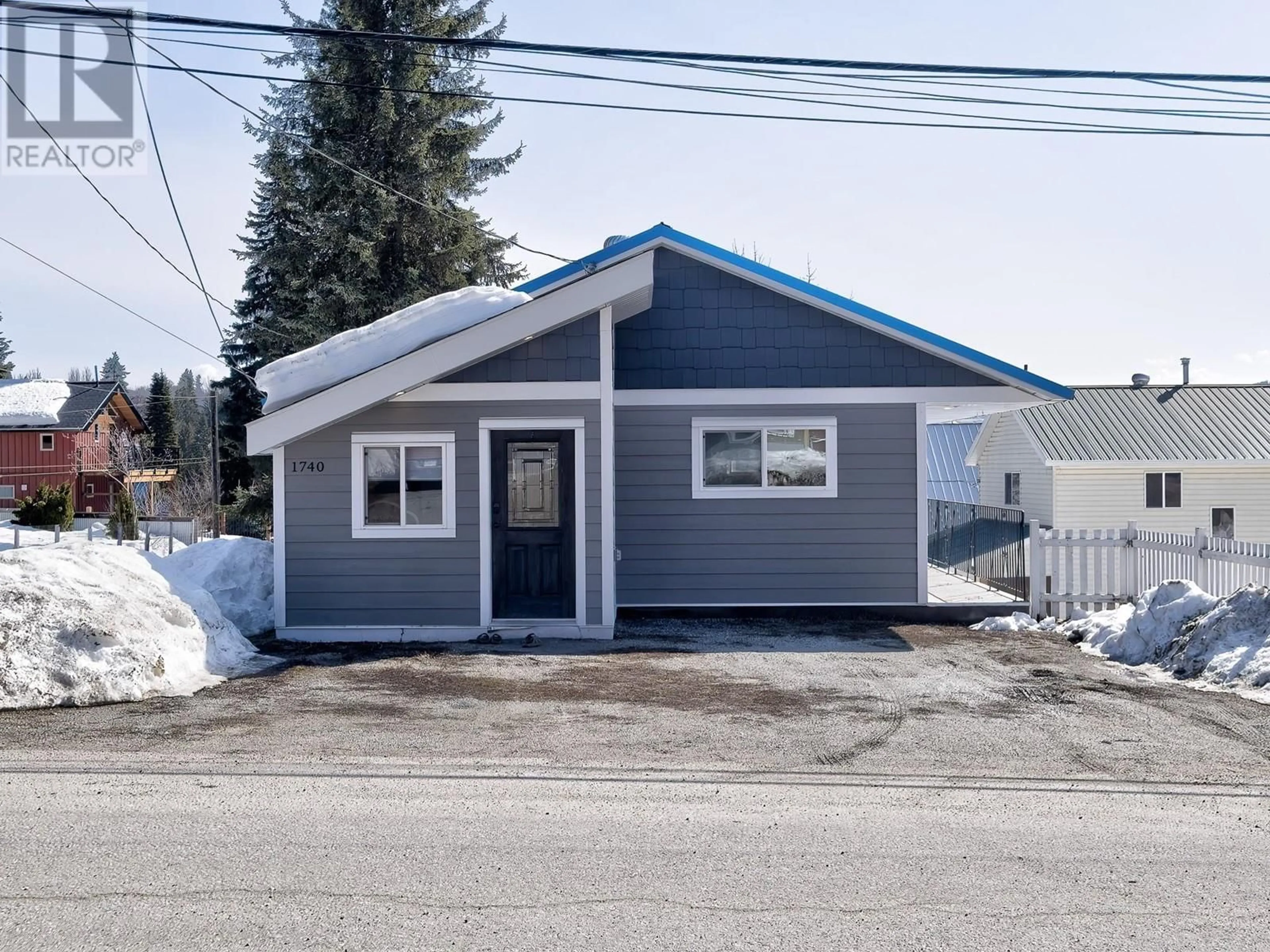Home with vinyl exterior material, street for 1740 NEVADA STREET, Rossland British Columbia V0G1Y0