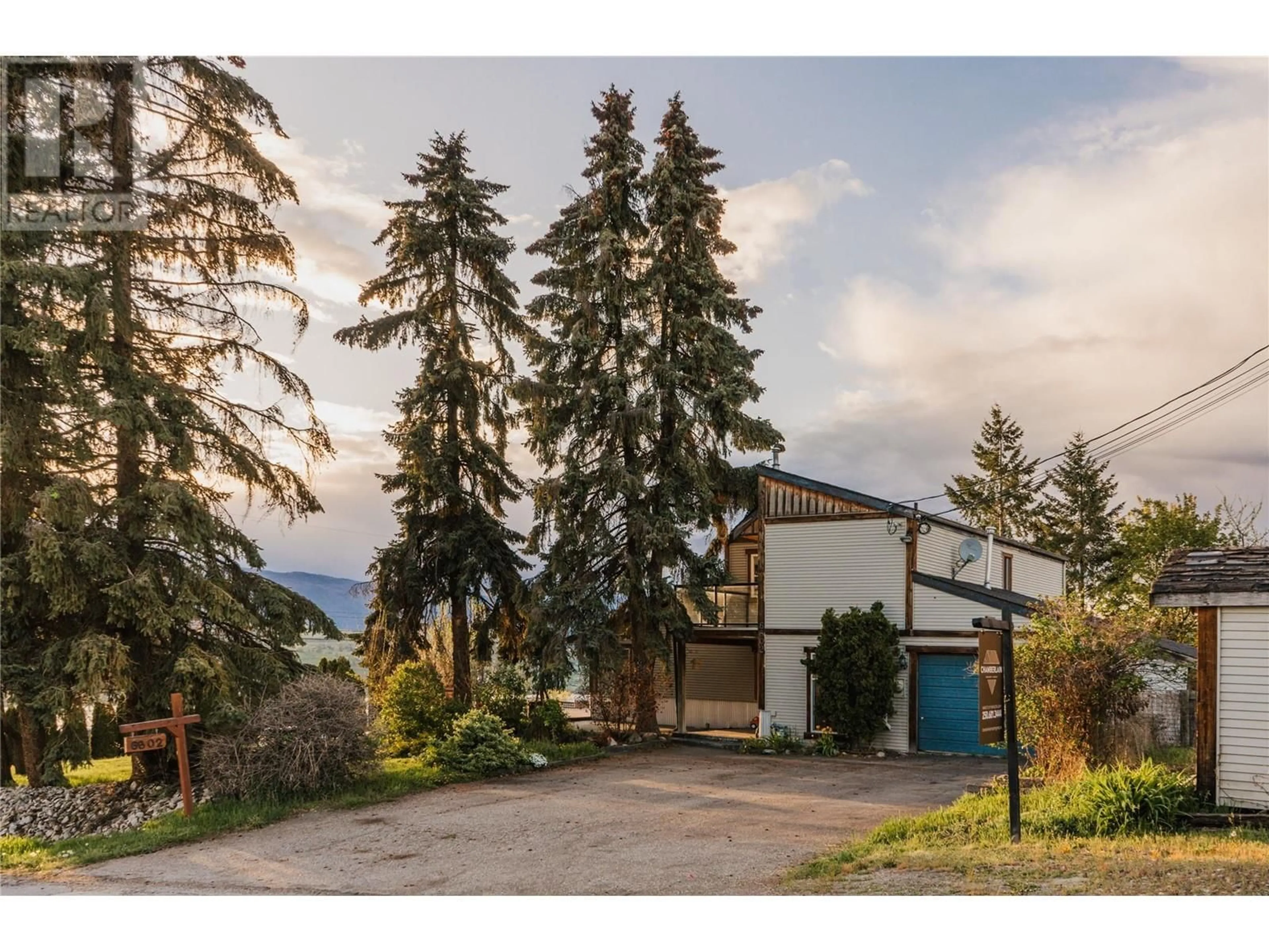 A pic from outside/outdoor area/front of a property/back of a property/a pic from drone, mountain view for 6802 MULBERRY ROAD, Vernon British Columbia V1B3T9