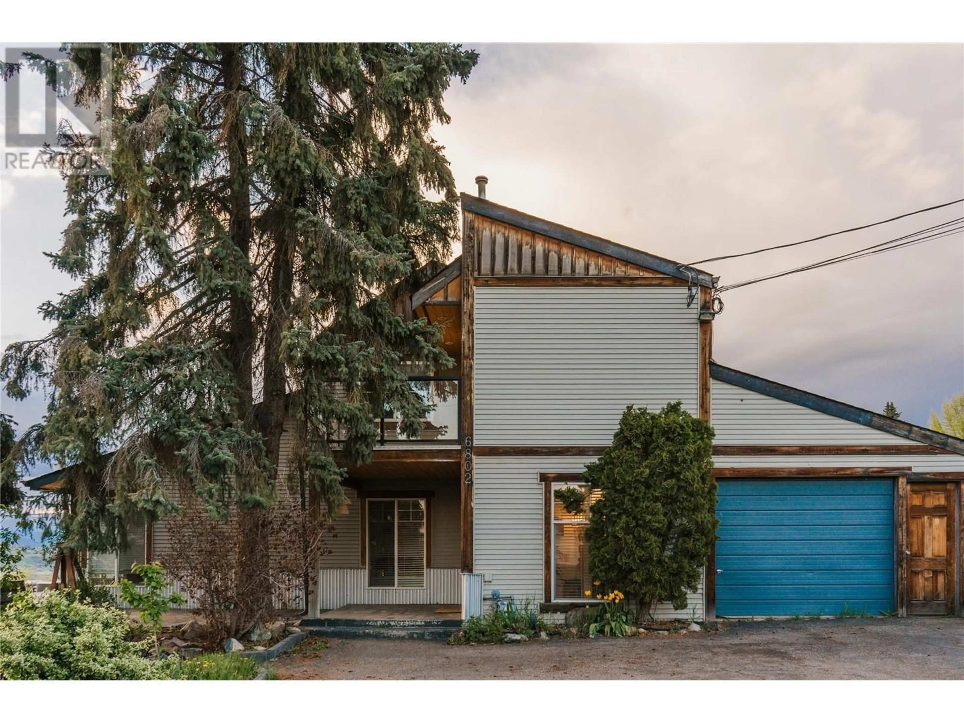 Home with vinyl exterior material, street for 6802 MULBERRY ROAD, Vernon British Columbia V1B3T9