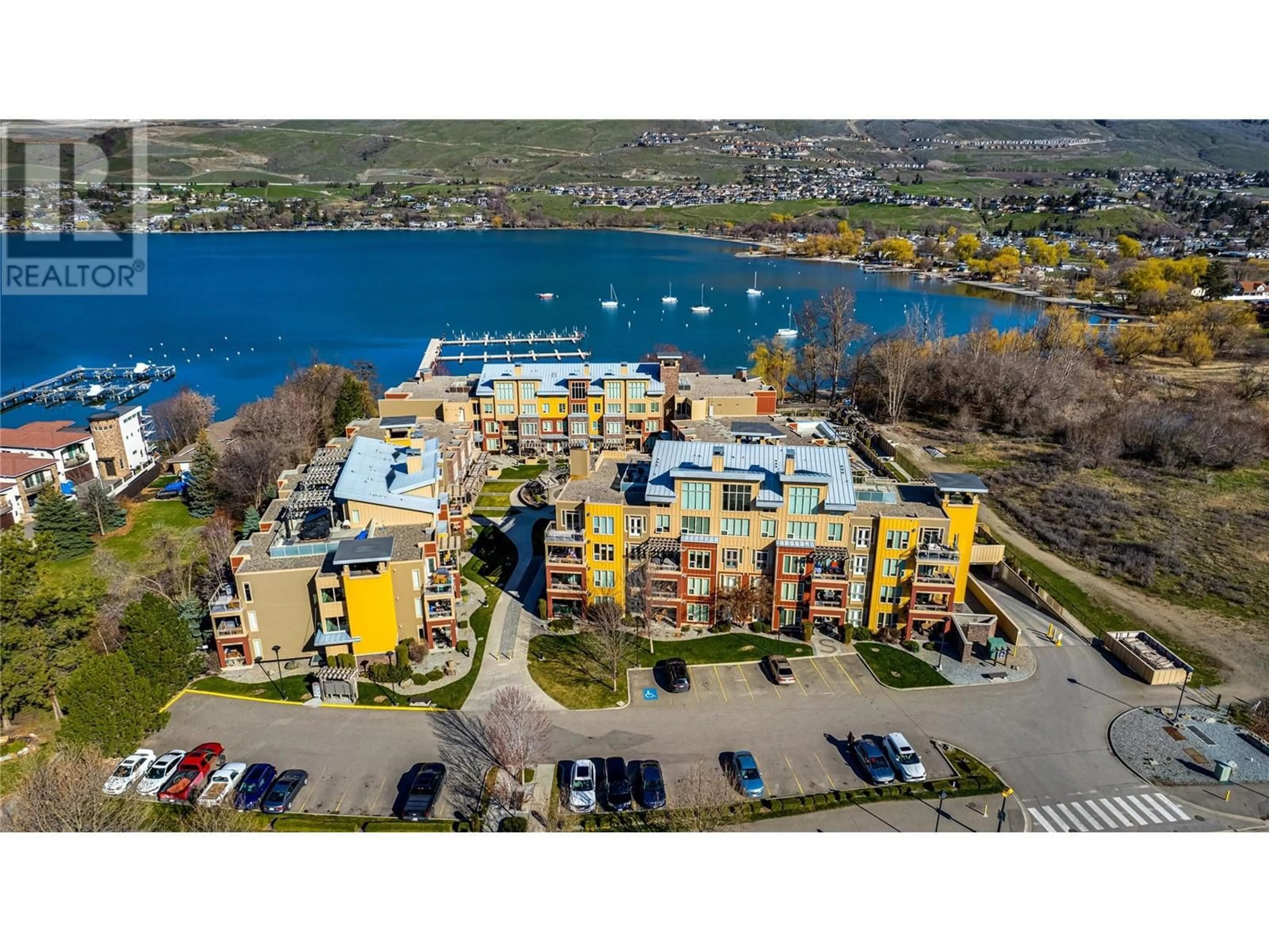 A pic from outside/outdoor area/front of a property/back of a property/a pic from drone, water/lake/river/ocean view for 1214 - 7343 OKANAGAN LANDING ROAD, Vernon British Columbia V1H2J6