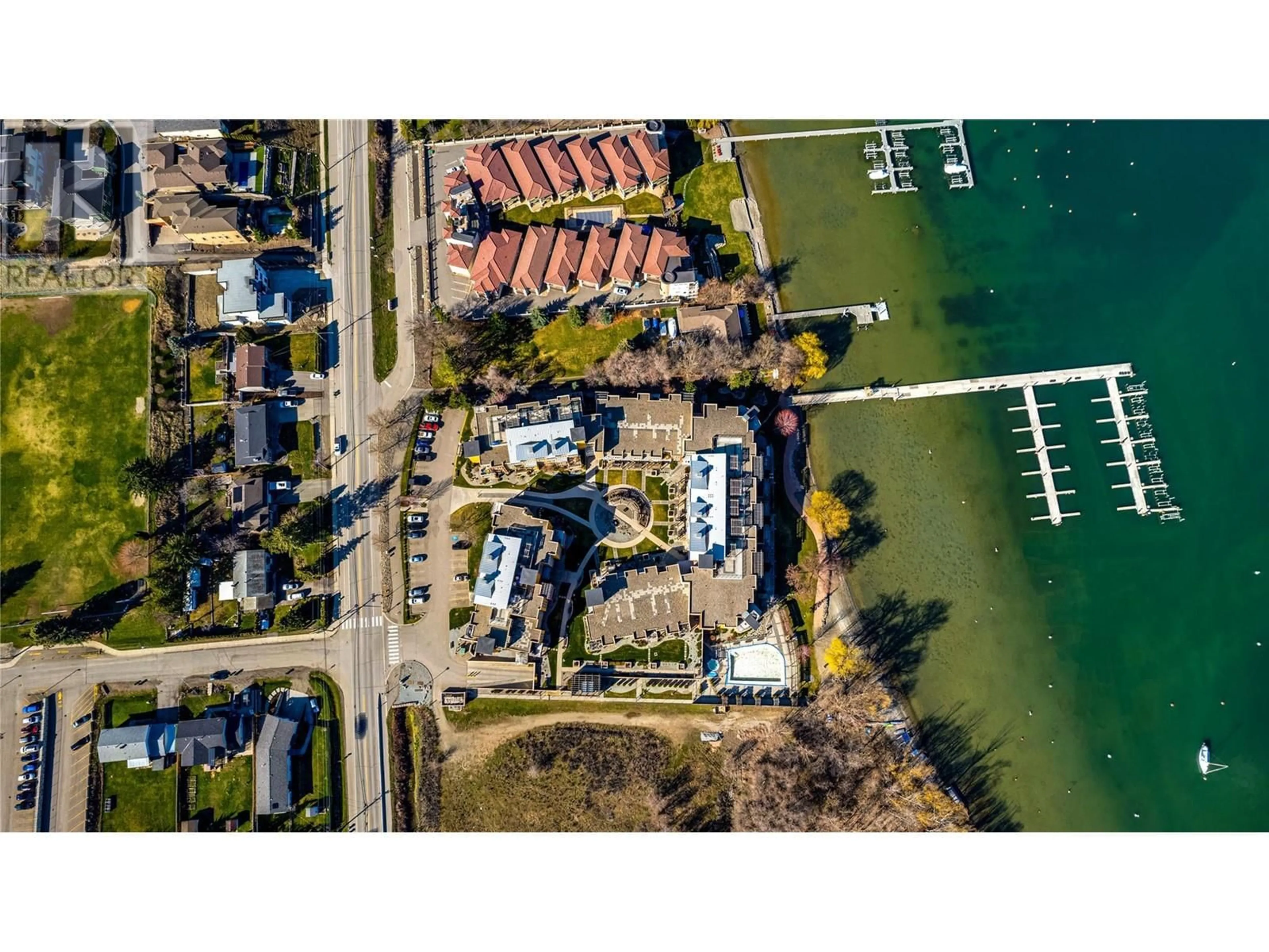 A pic from outside/outdoor area/front of a property/back of a property/a pic from drone, water/lake/river/ocean view for 1214 - 7343 OKANAGAN LANDING ROAD, Vernon British Columbia V1H2J6