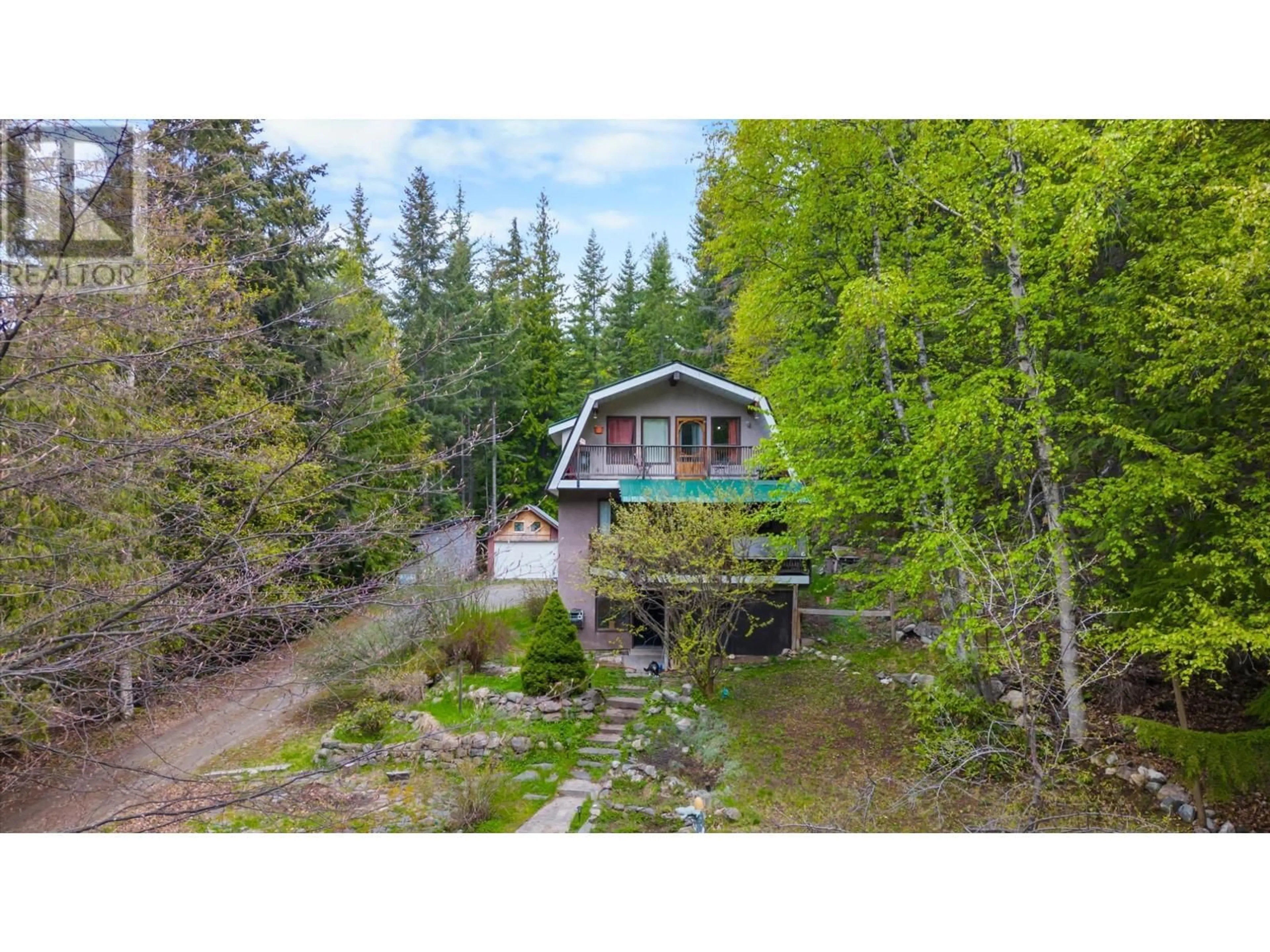 A pic from outside/outdoor area/front of a property/back of a property/a pic from drone, forest/trees view for 426 ASPEN ROAD, Riondel British Columbia V0B2B0