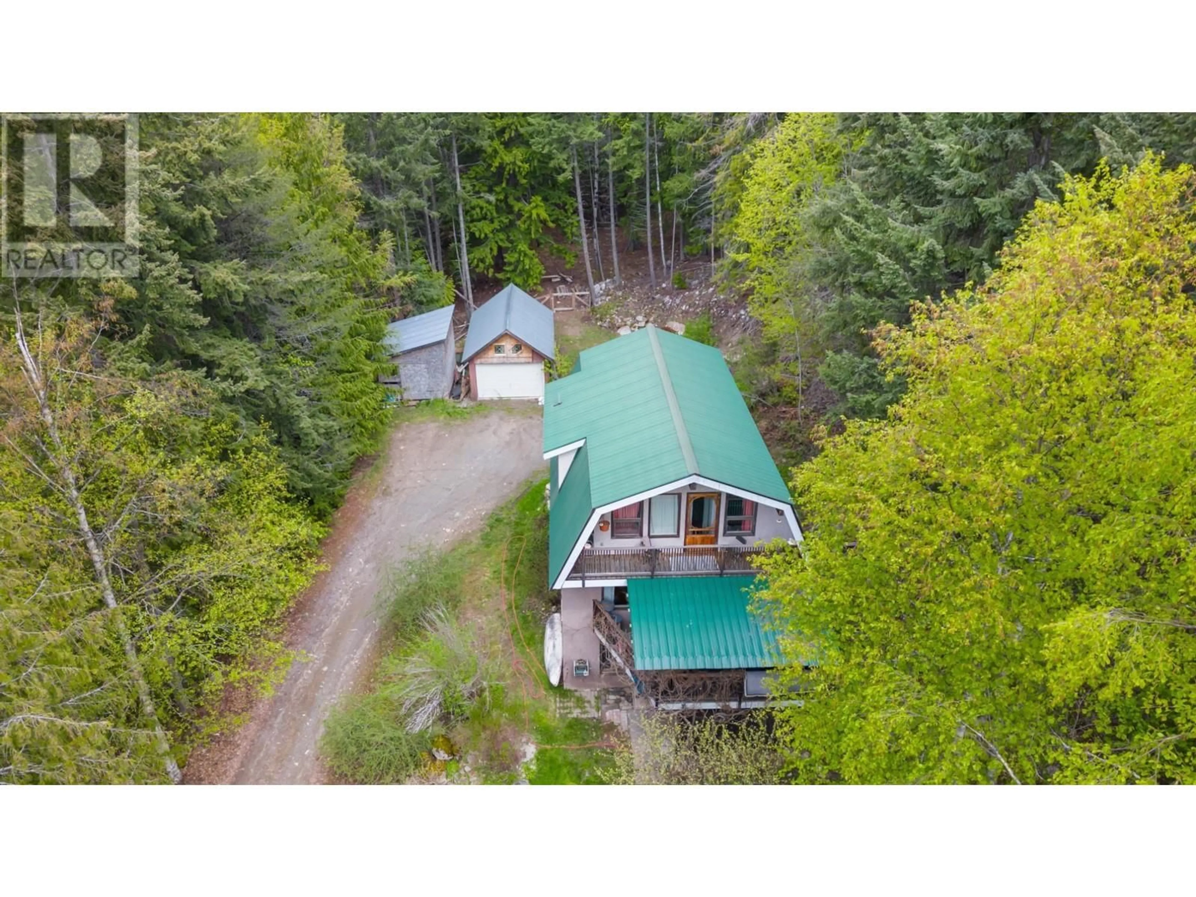 A pic from outside/outdoor area/front of a property/back of a property/a pic from drone, forest/trees view for 426 ASPEN ROAD, Riondel British Columbia V0B2B0