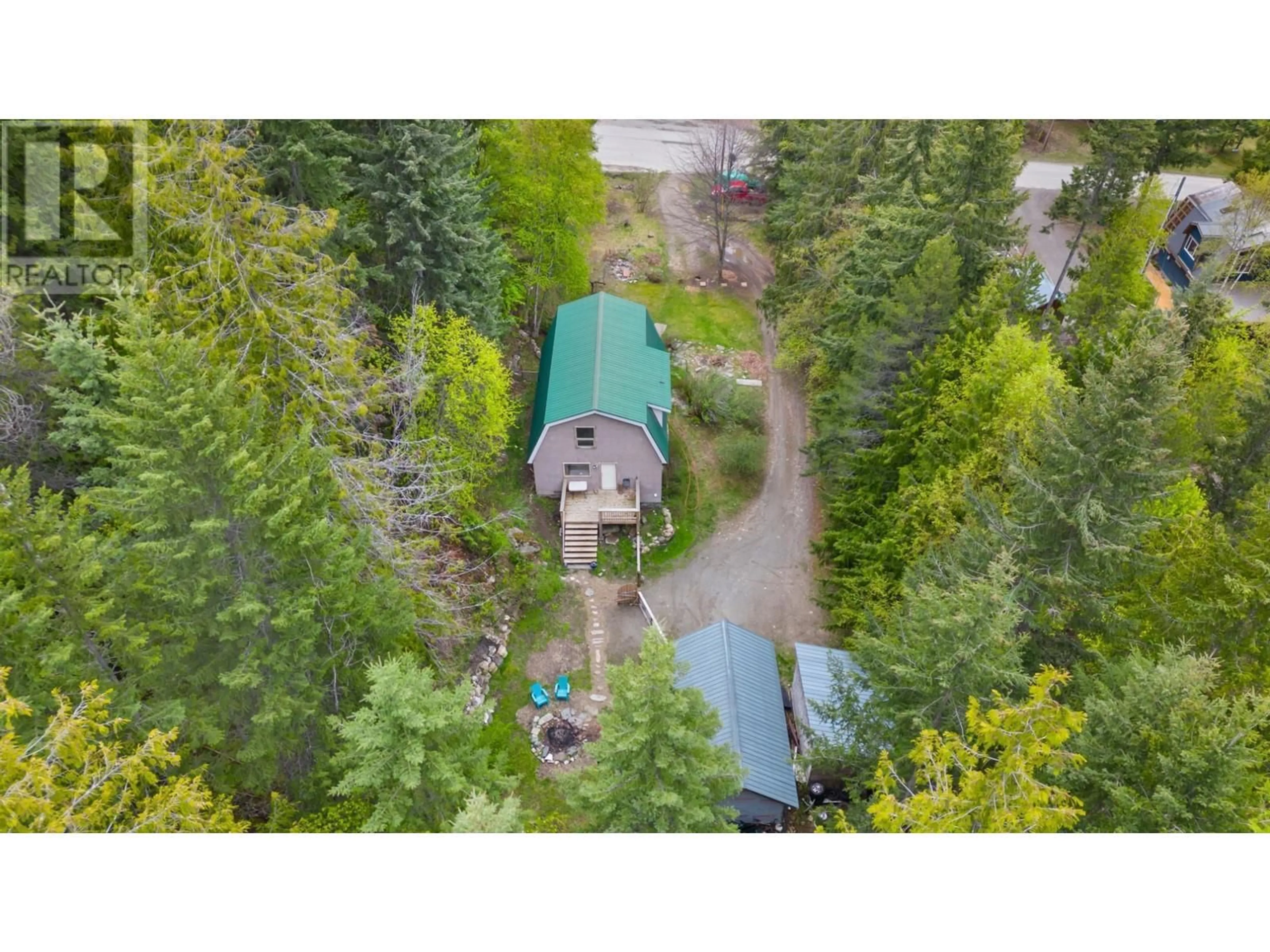 A pic from outside/outdoor area/front of a property/back of a property/a pic from drone, forest/trees view for 426 ASPEN ROAD, Riondel British Columbia V0B2B0
