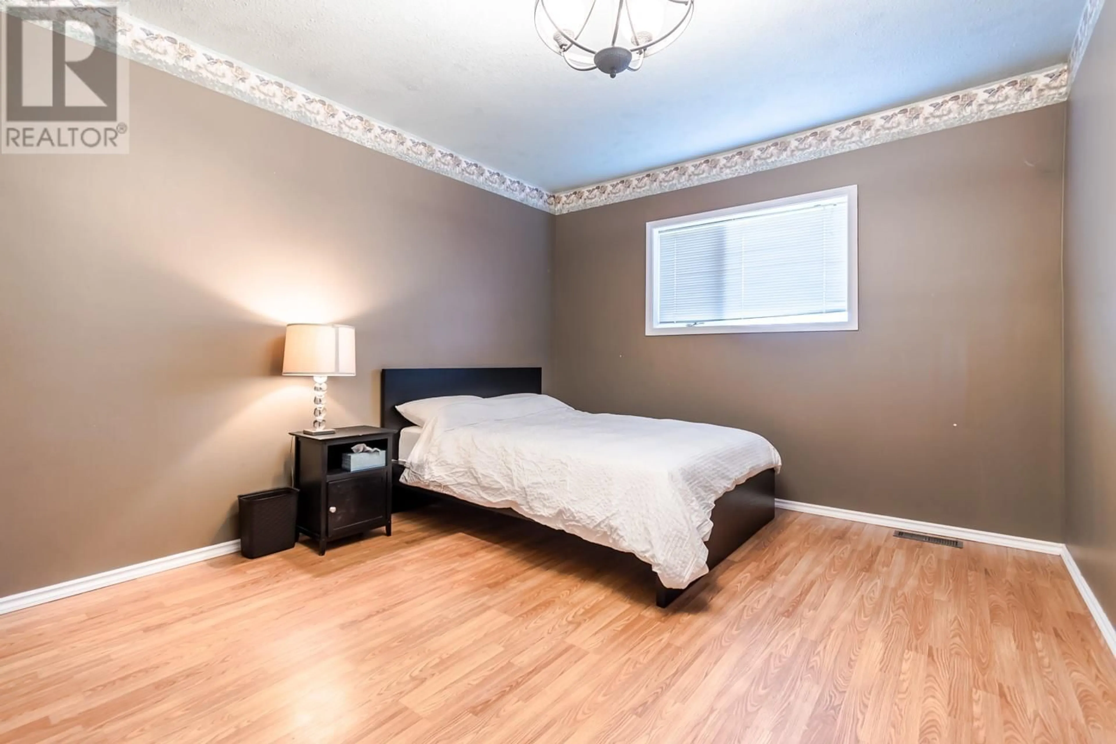 Bedroom with bed, wood/laminate floor for 760 FOSTER DRIVE, Lillooet British Columbia V0K1V0