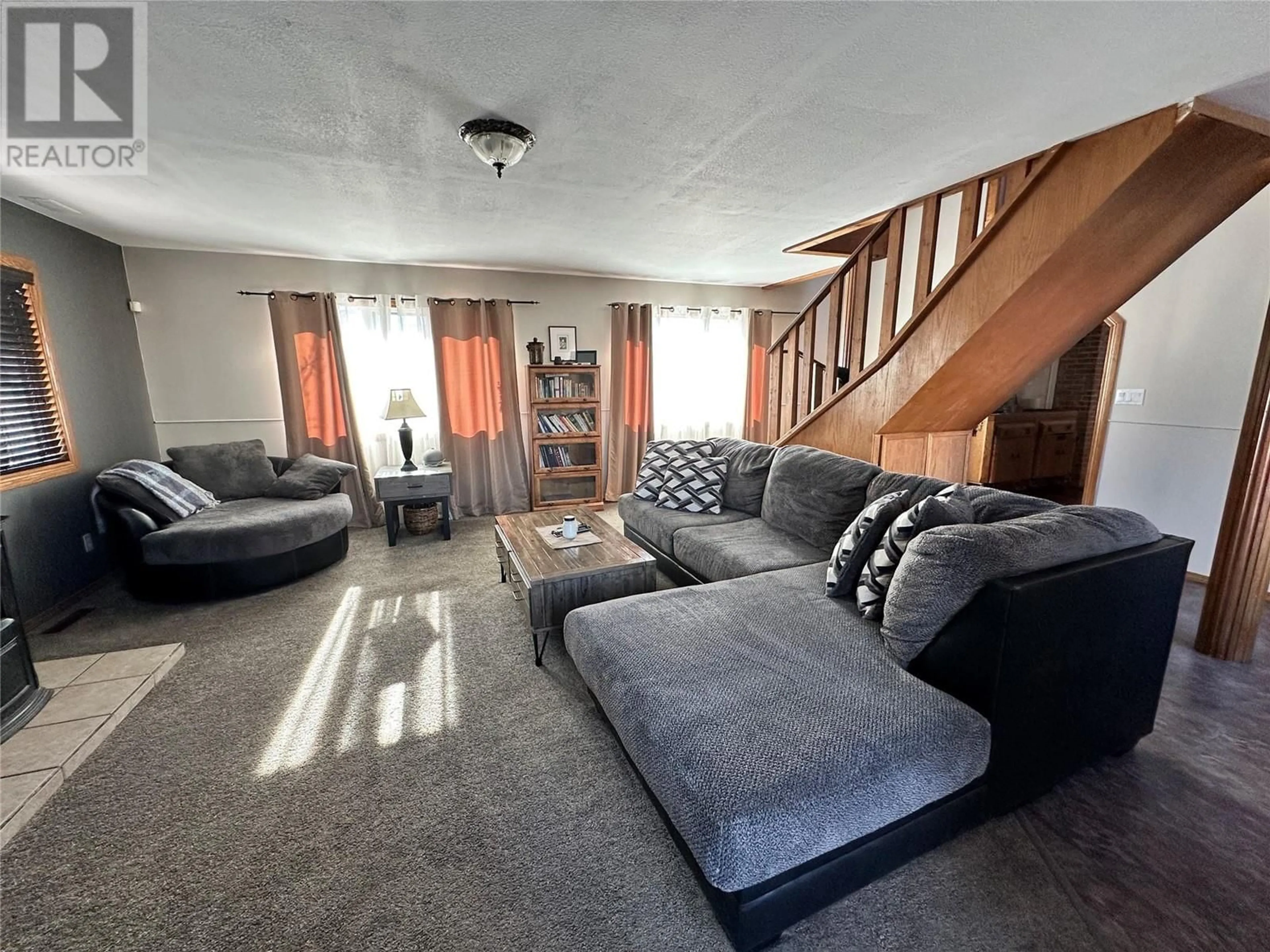 Living room with furniture, unknown for 1528 102 AVENUE, Dawson Creek British Columbia V1G2E2