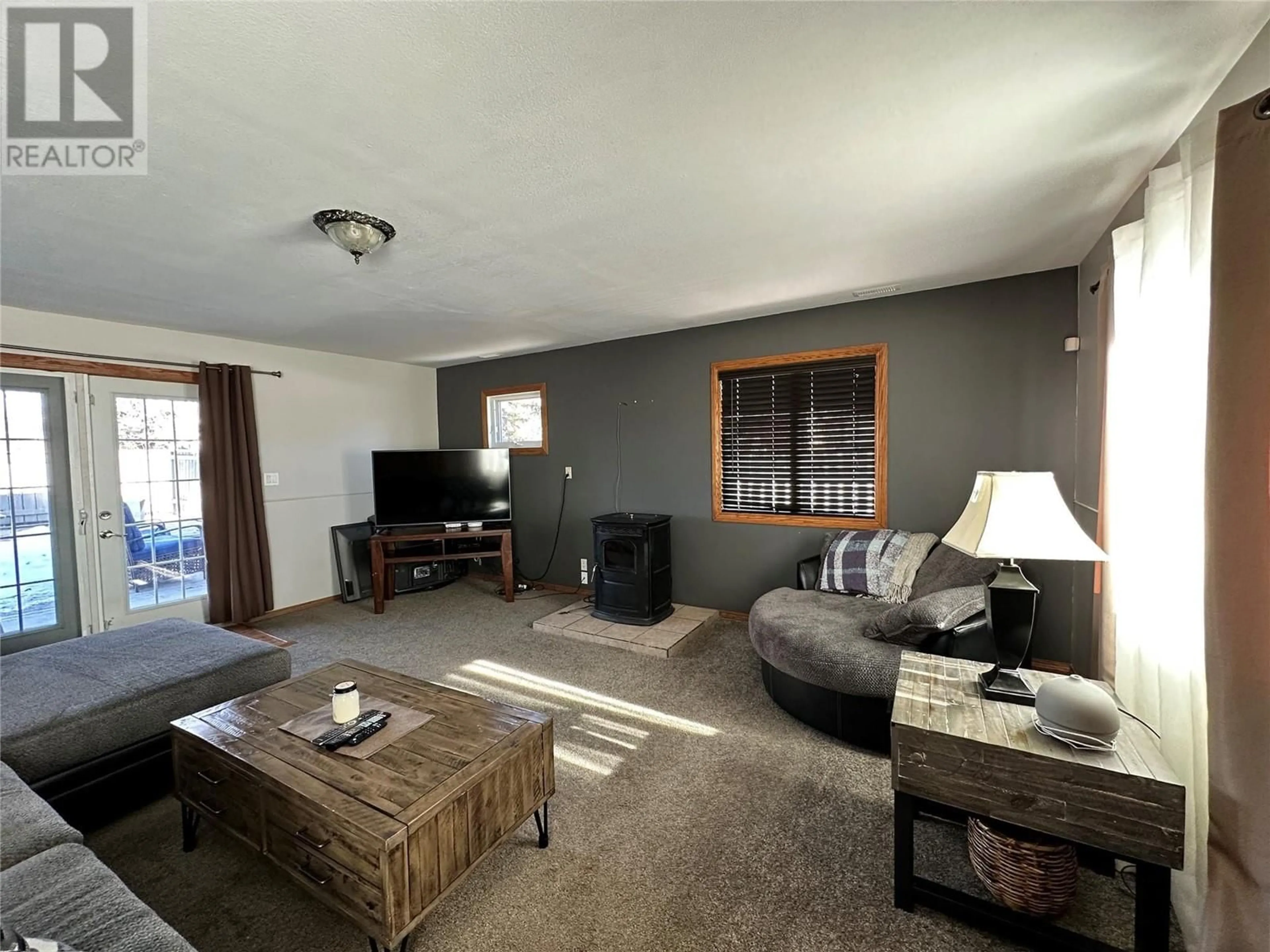 Living room with furniture, unknown for 1528 102 AVENUE, Dawson Creek British Columbia V1G2E2