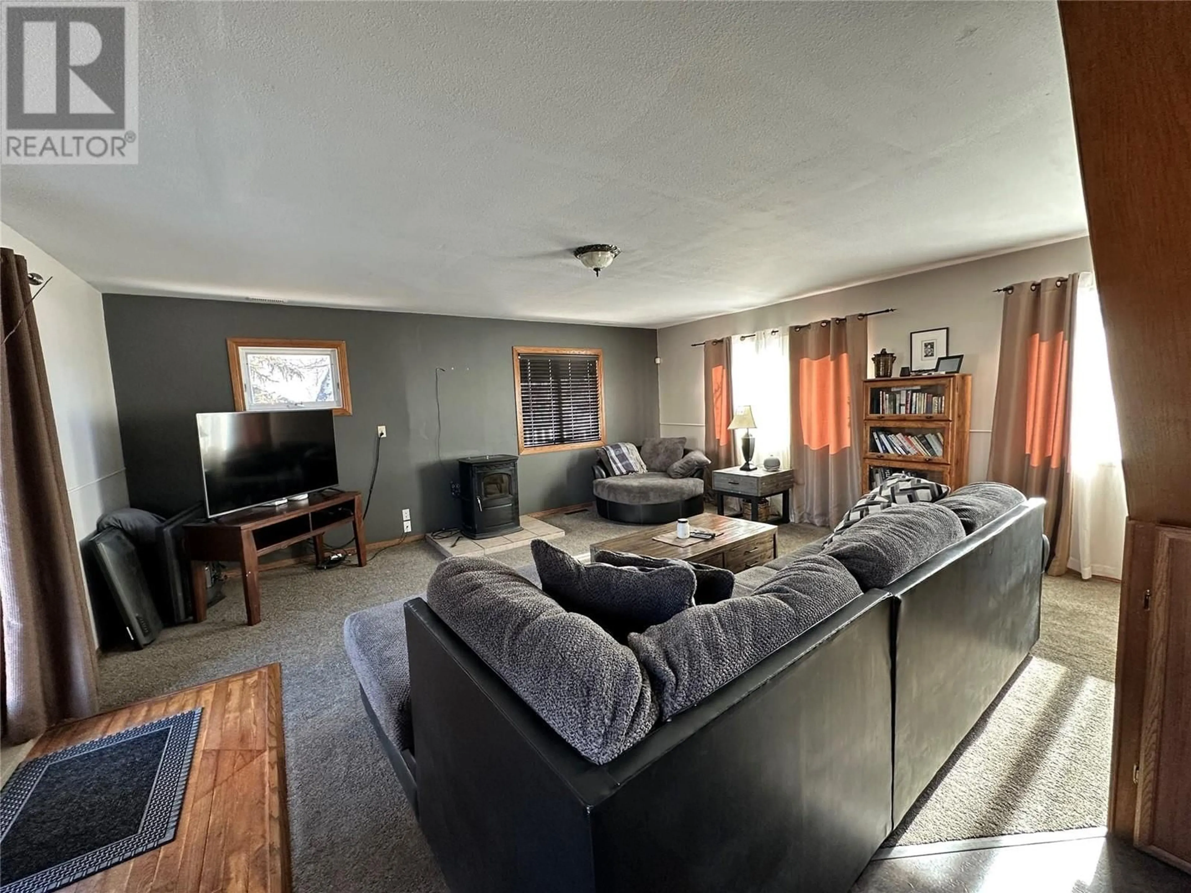 Living room with furniture, unknown for 1528 102 AVENUE, Dawson Creek British Columbia V1G2E2