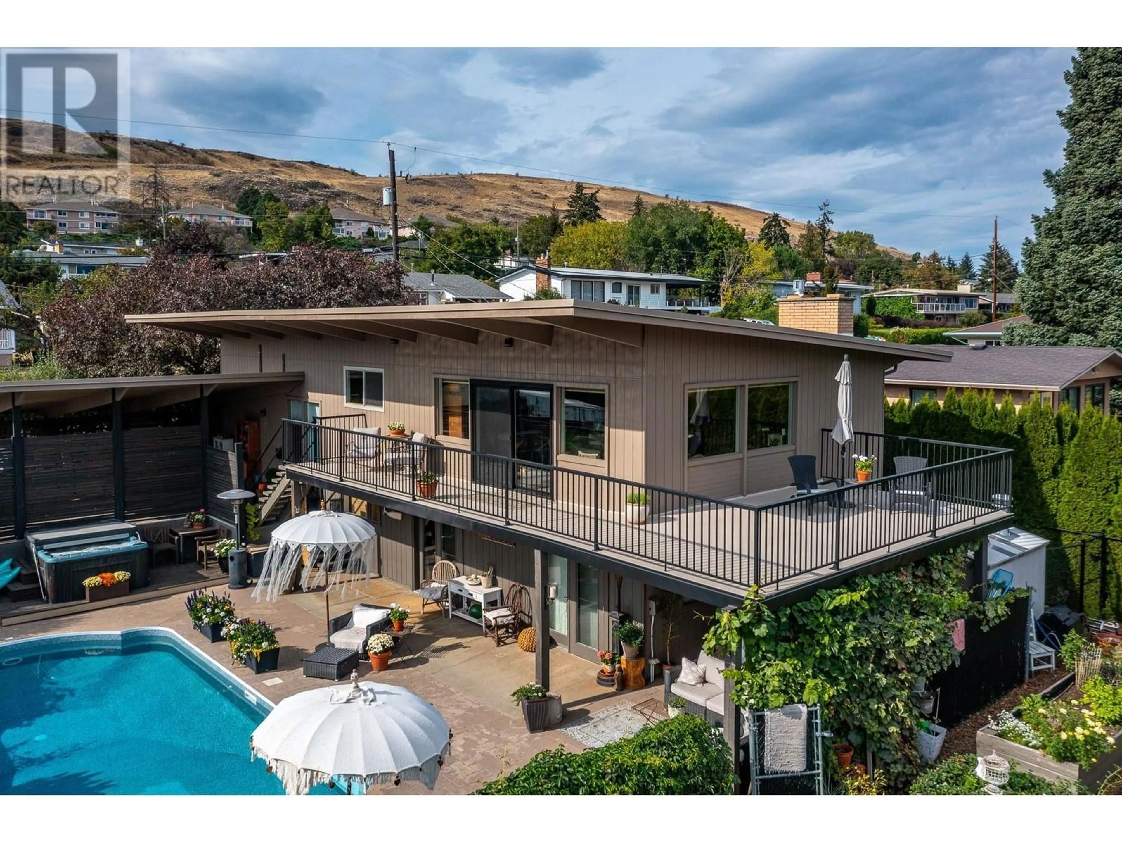 A pic from outside/outdoor area/front of a property/back of a property/a pic from drone, mountain view for 8600 FITZMAURICE DRIVE, Coldstream British Columbia V1B1X4