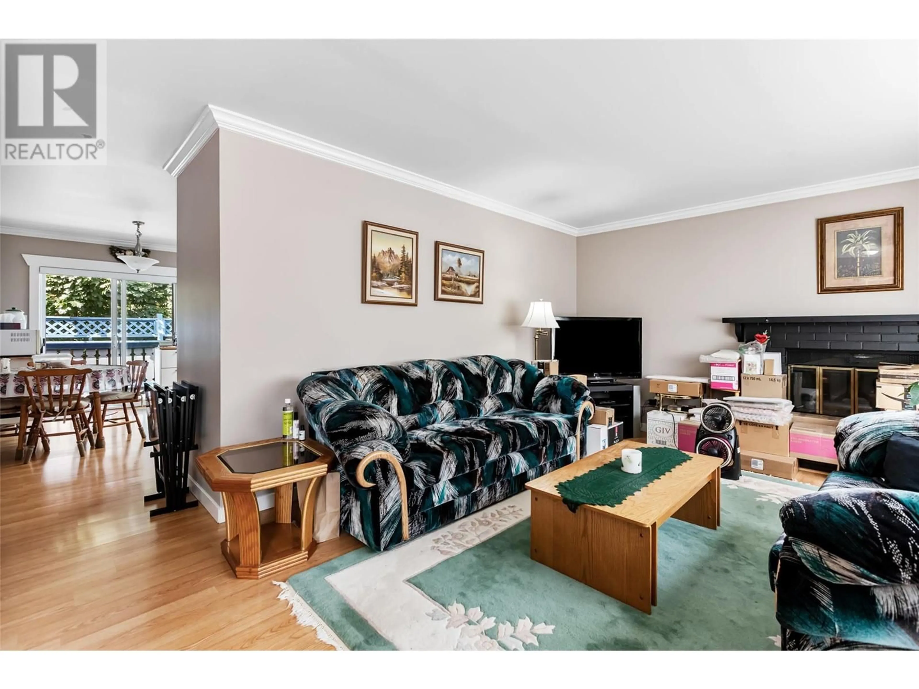 Living room with furniture, wood/laminate floor for 5911 EHLERS ROAD, Peachland British Columbia V0H1X0