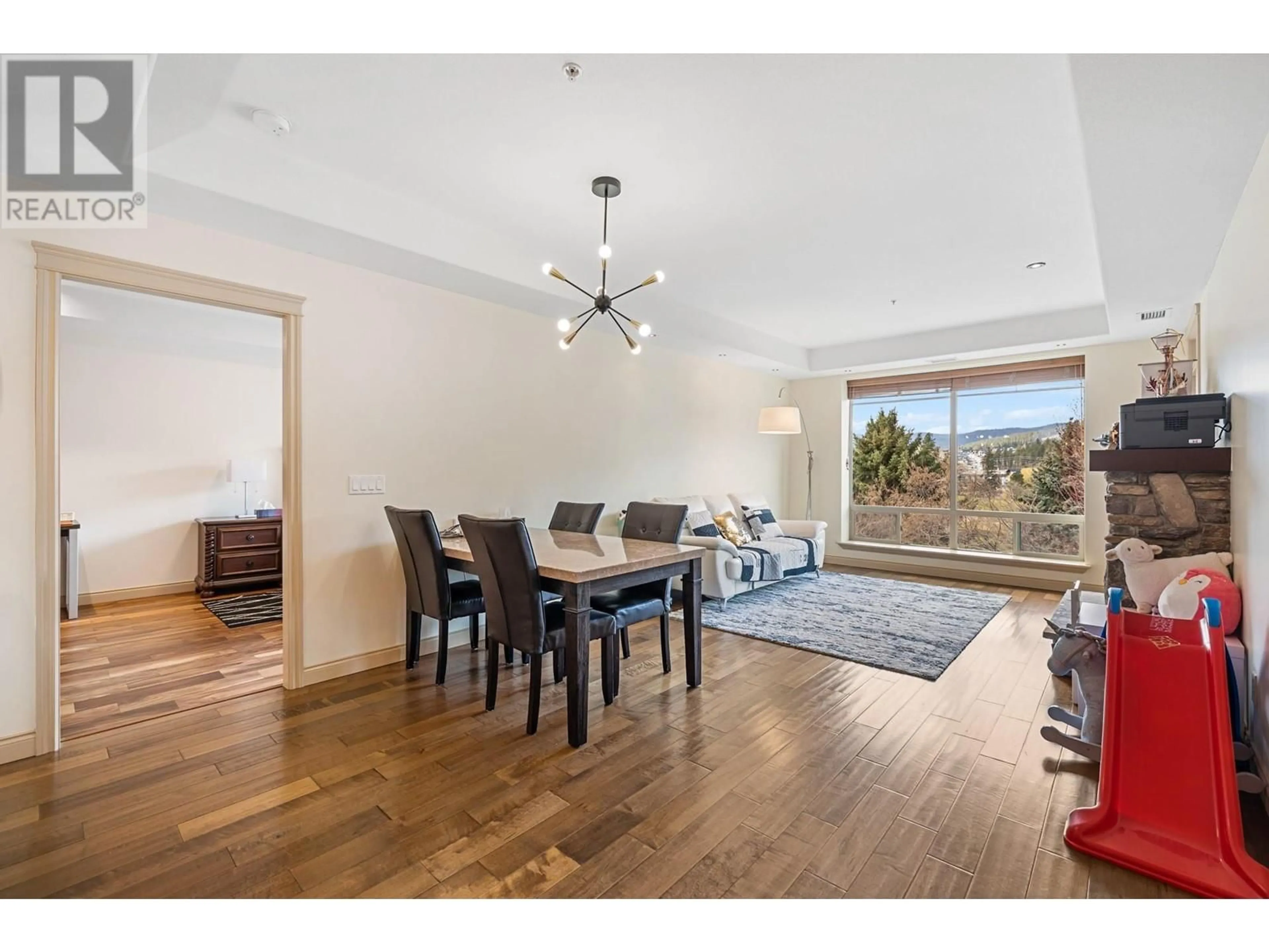 Dining room, wood/laminate floor for 202 - 2770 AUBURN ROAD, West Kelowna British Columbia V4T4C2
