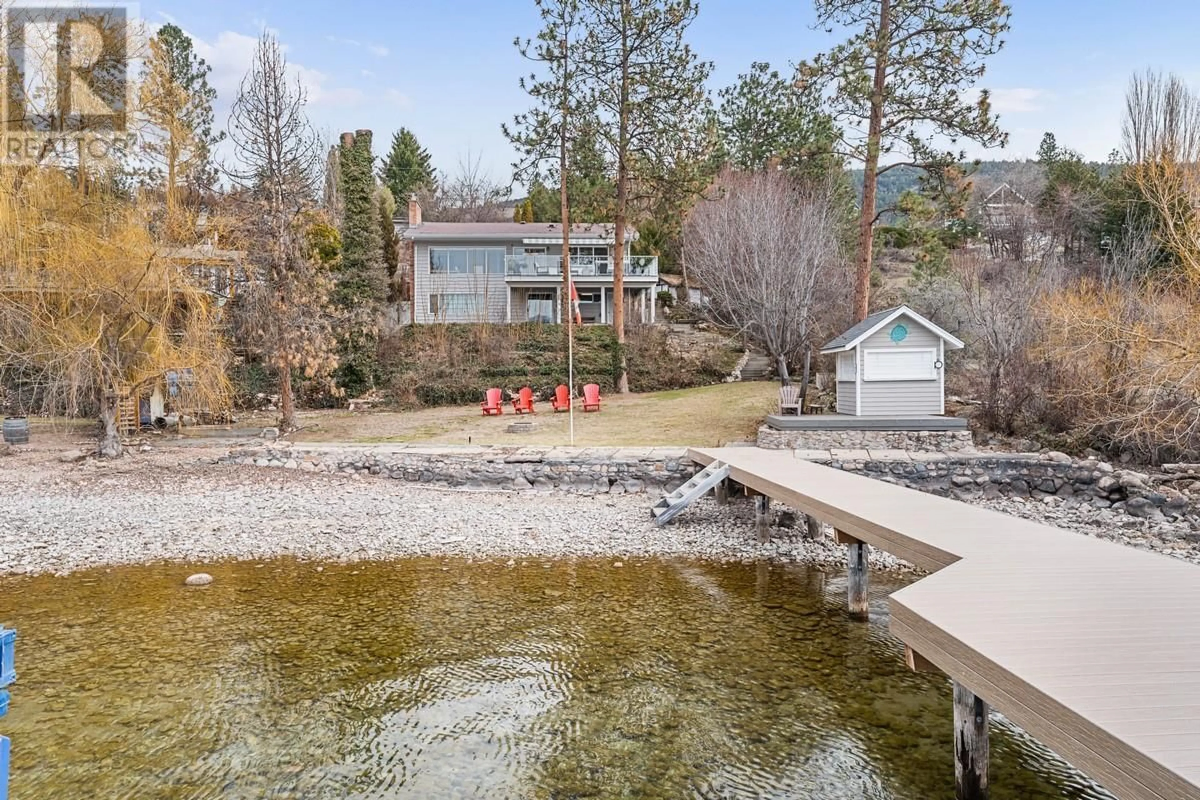 A pic from outside/outdoor area/front of a property/back of a property/a pic from drone, water/lake/river/ocean view for 17110 CORAL BEACH ROAD, Lake Country British Columbia V4V1B9