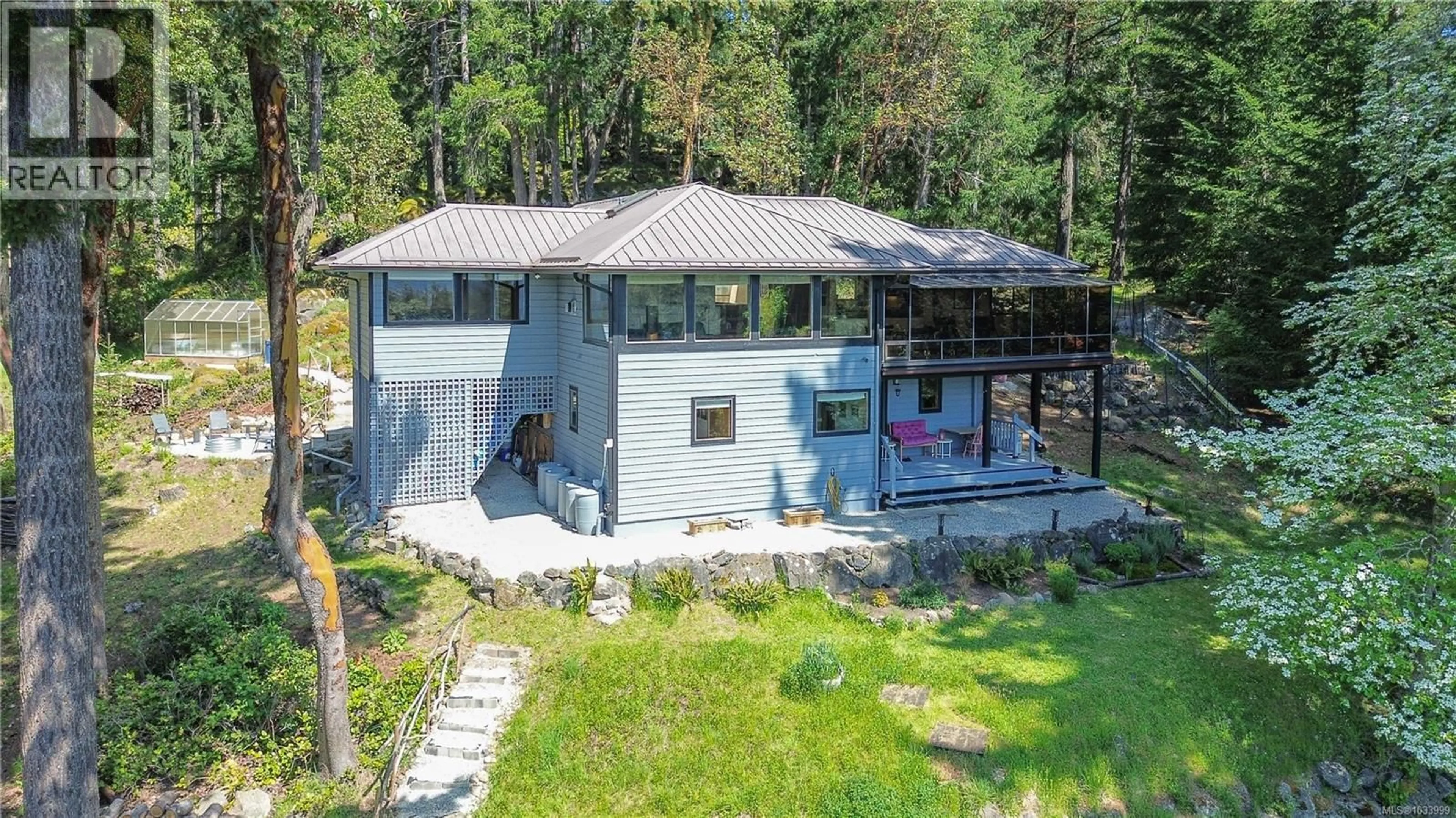 A pic from outside/outdoor area/front of a property/back of a property/a pic from drone, unknown for 113 QUAIL CRESCENT, Salt Spring British Columbia V8K1H1