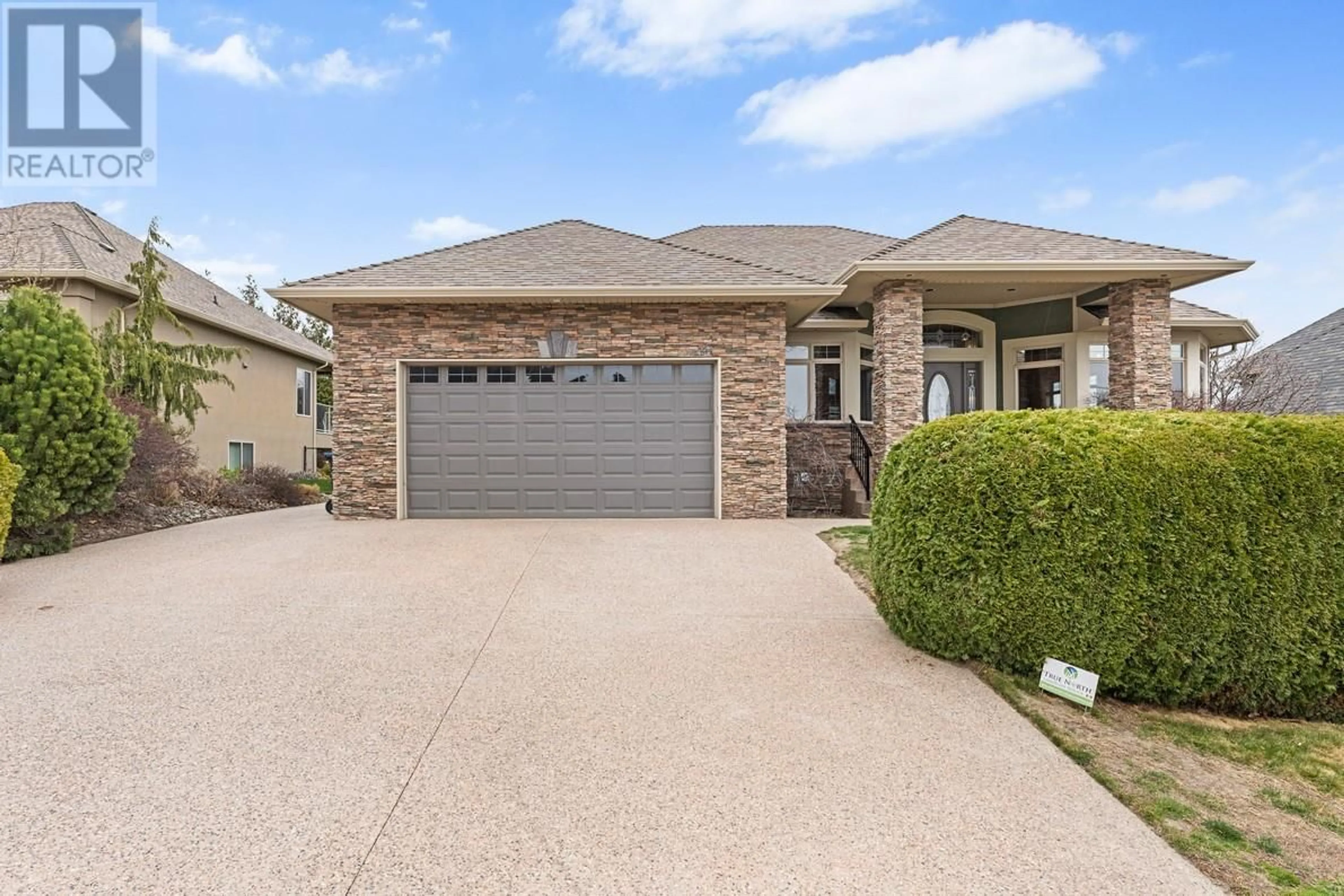 Home with brick exterior material, street for 3079 THACKER DRIVE, West Kelowna British Columbia V1Z1X5