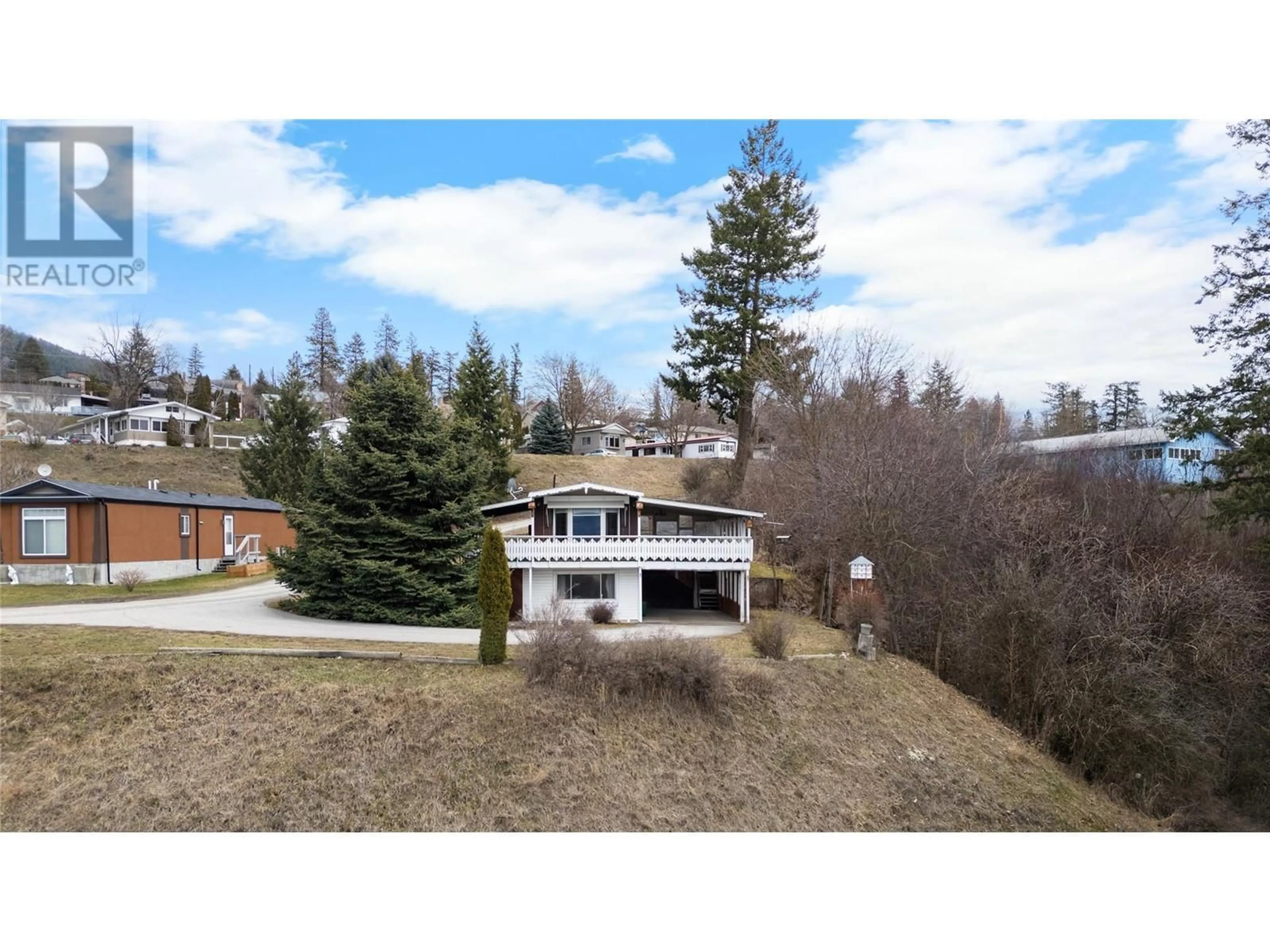 A pic from outside/outdoor area/front of a property/back of a property/a pic from drone, mountain view for 27 - 445 6TH AVENUE NORTH, Creston British Columbia V0B1G3