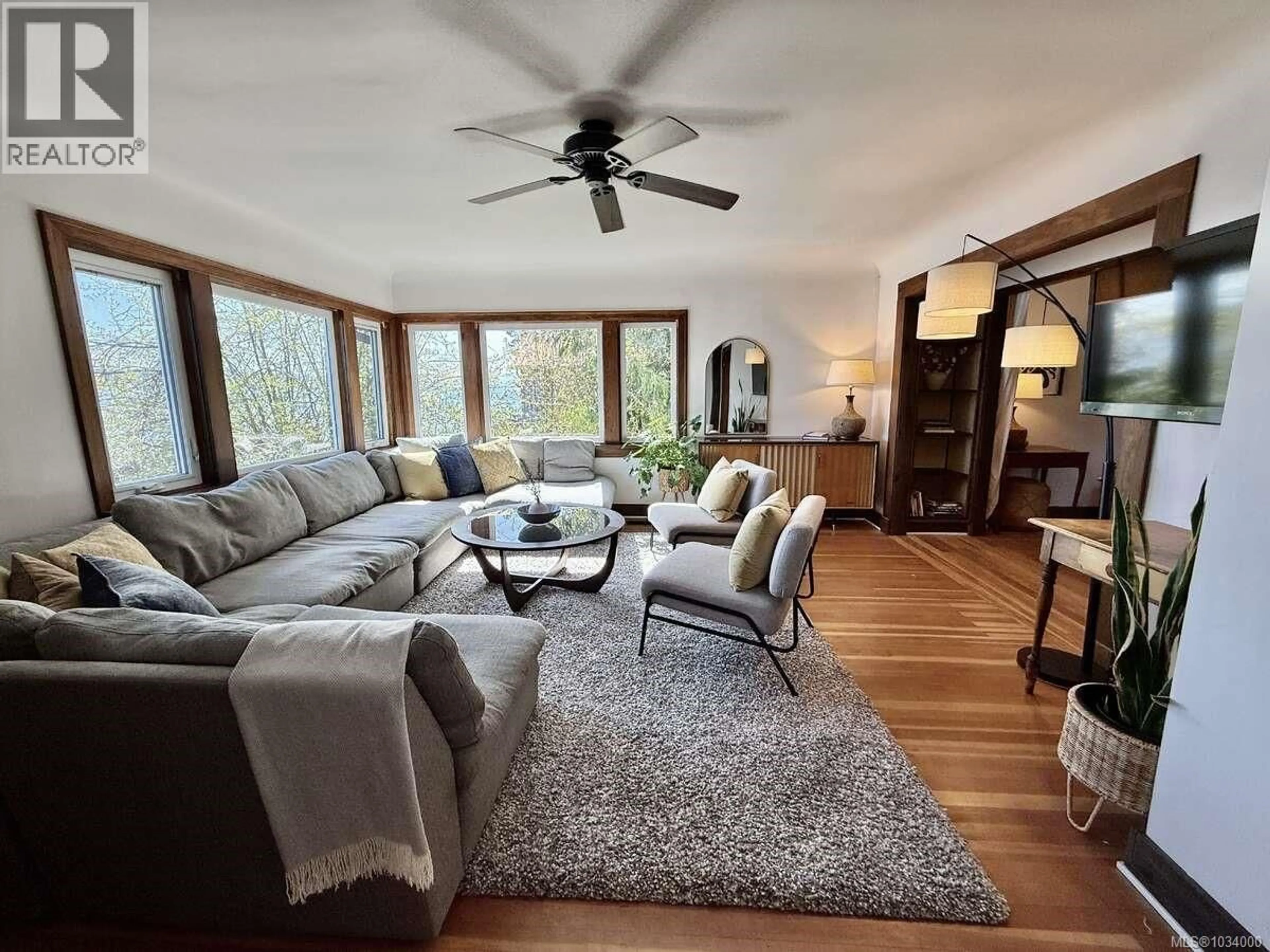 Living room with furniture, unknown for 5696 ISLAND HIGHWAY SOUTH, Union Bay British Columbia V0R3B0