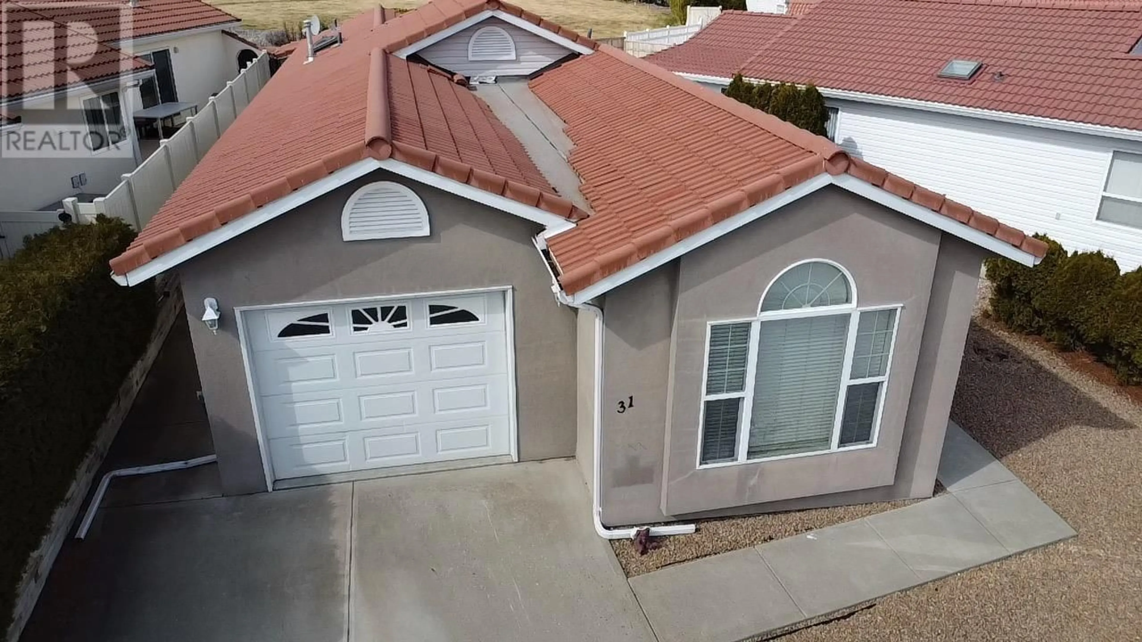 A pic from outside/outdoor area/front of a property/back of a property/a pic from drone, street for 31 - 9400 115TH STREET, Osoyoos British Columbia V0H1V5