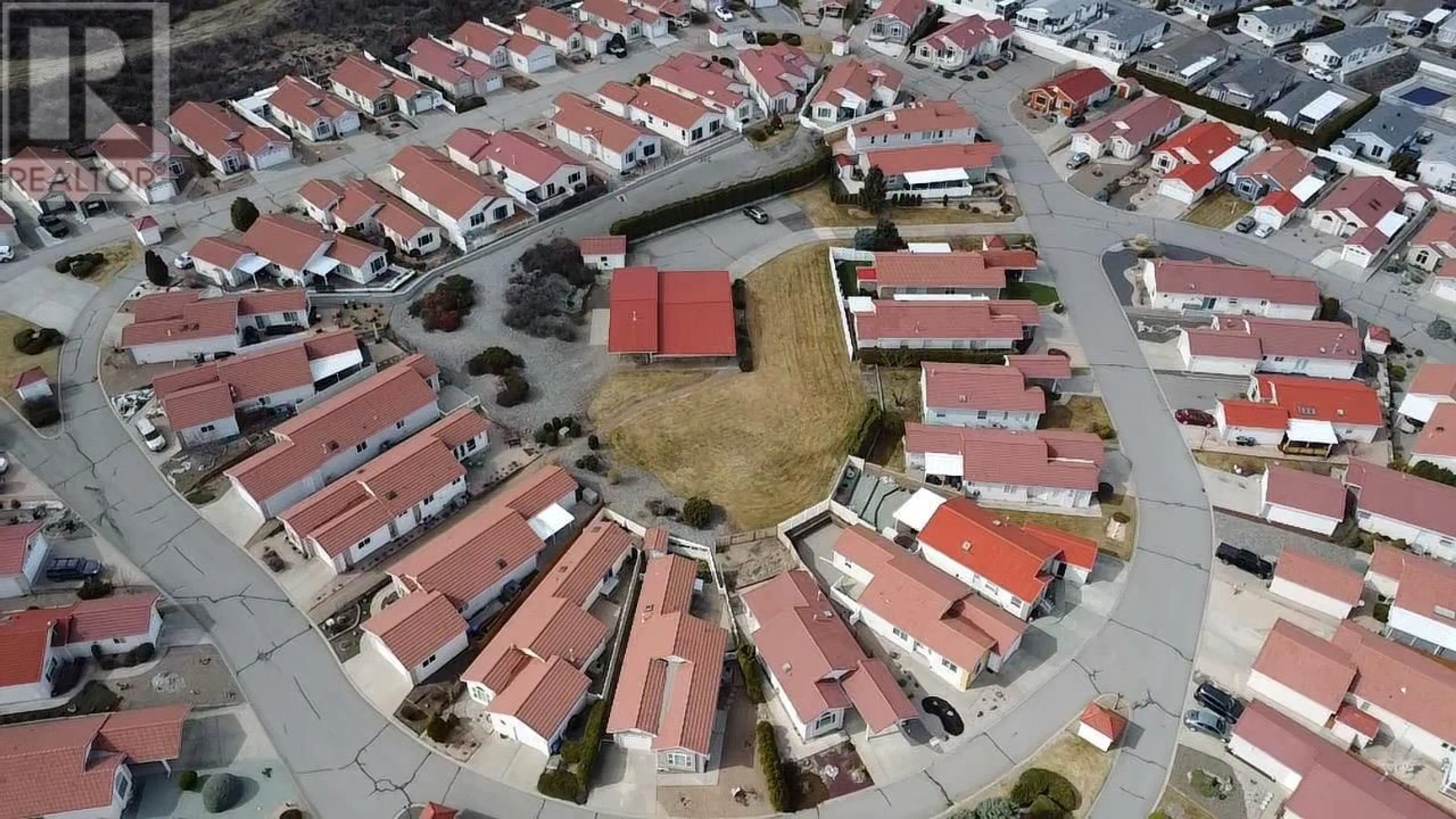 A pic from outside/outdoor area/front of a property/back of a property/a pic from drone, street for 31 - 9400 115TH STREET, Osoyoos British Columbia V0H1V5