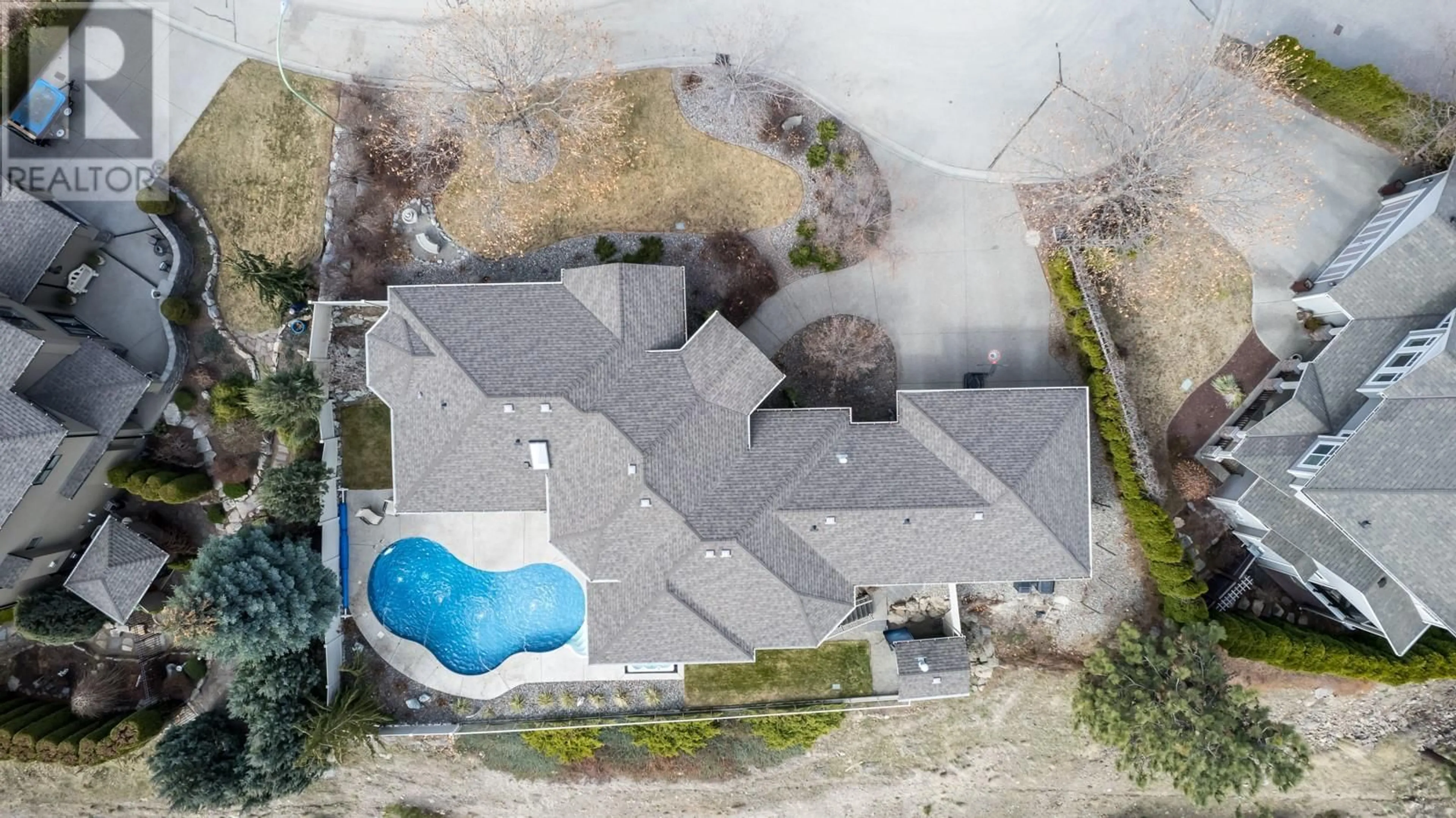 A pic from outside/outdoor area/front of a property/back of a property/a pic from drone, unknown for 1118 PEAK POINT DRIVE, West Kelowna British Columbia V1Z4A9