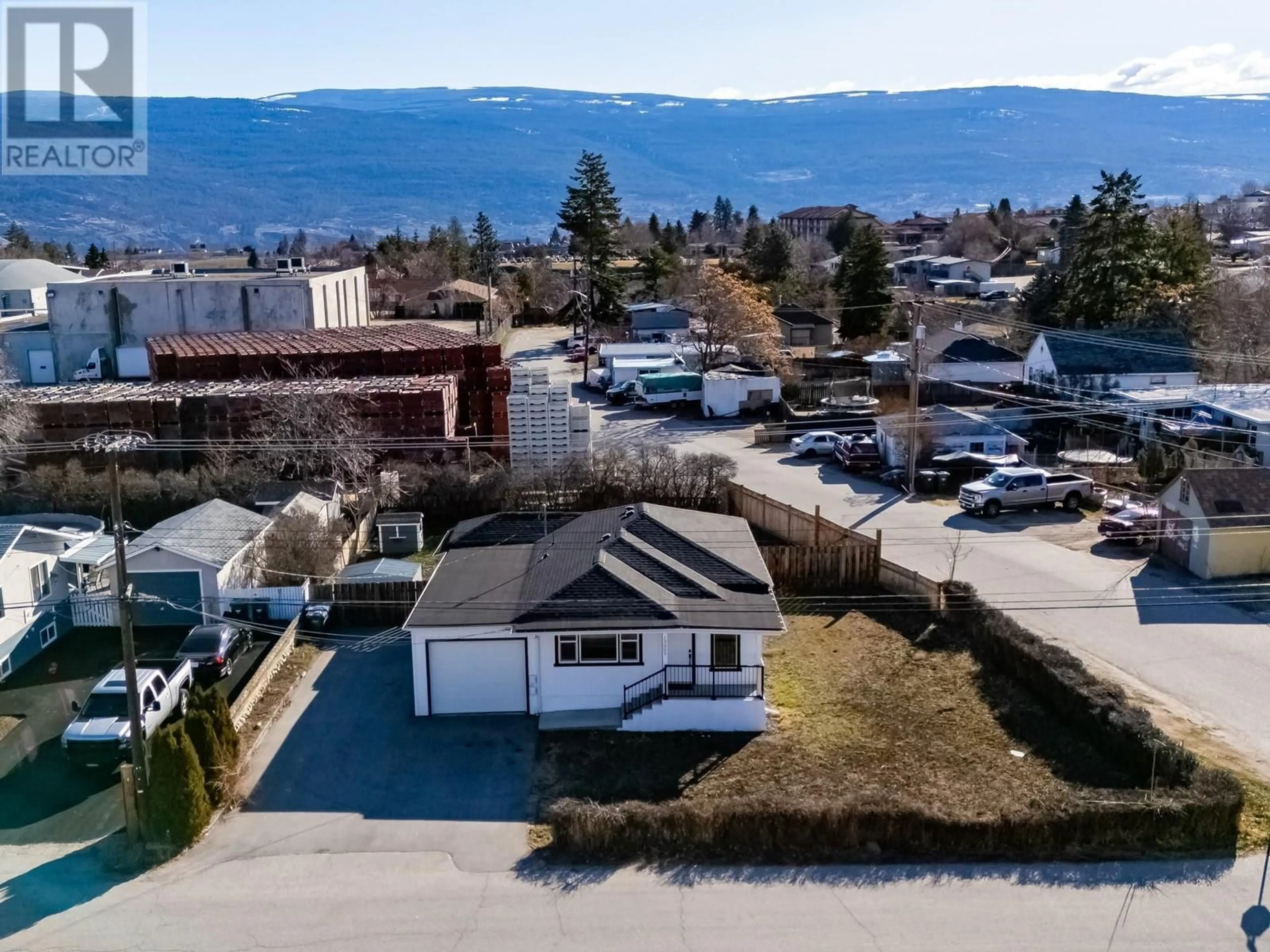 A pic from outside/outdoor area/front of a property/back of a property/a pic from drone, mountain view for 13009 ARMSTRONG AVENUE, Summerland British Columbia V0H1Z3